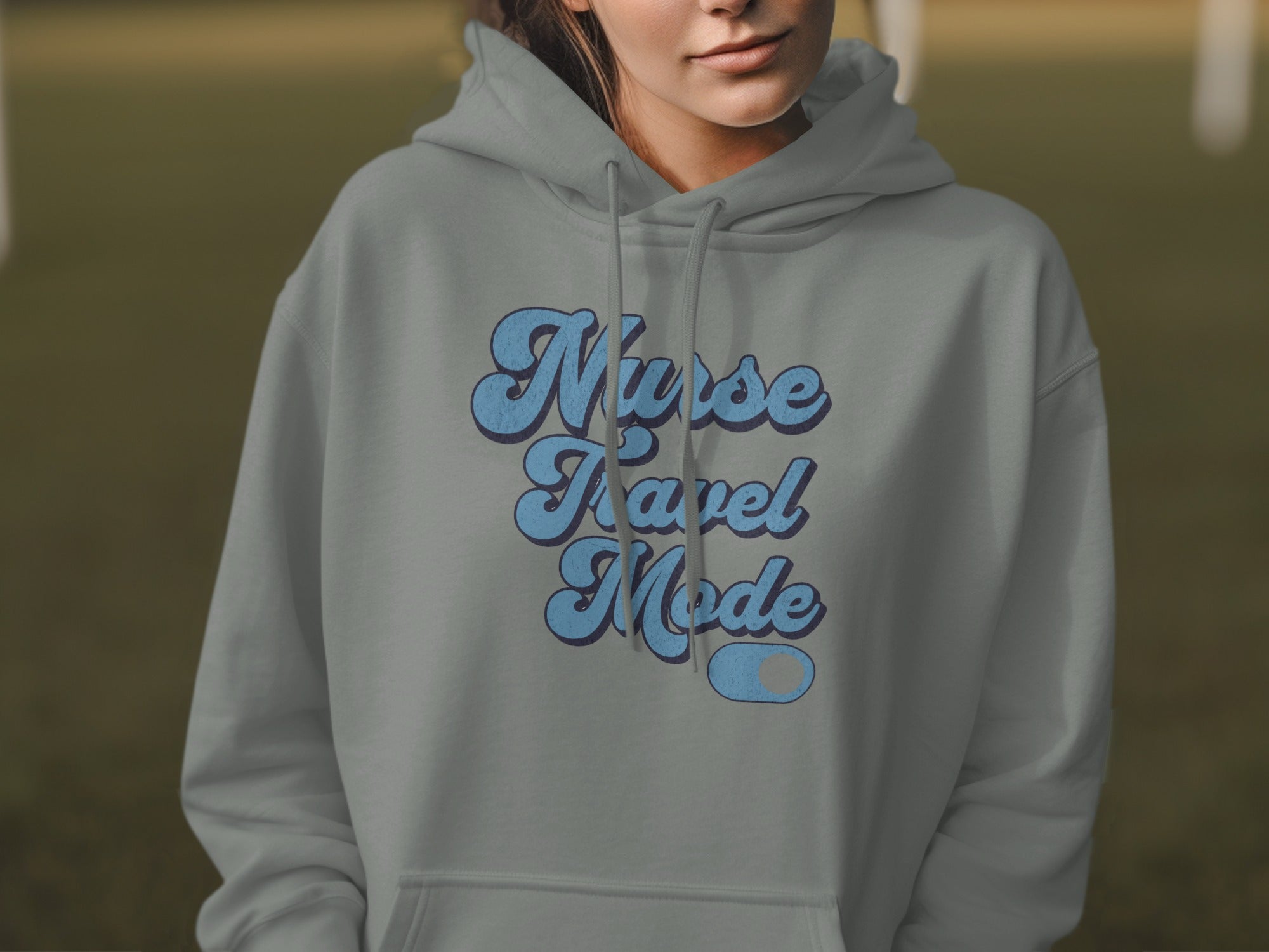 Grey hoodie with "Nurse Travel Mode" text and a toggle switch.