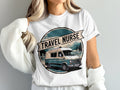 Travel nurse graphic on white t-shirt featuring a retro camper van and mountains.