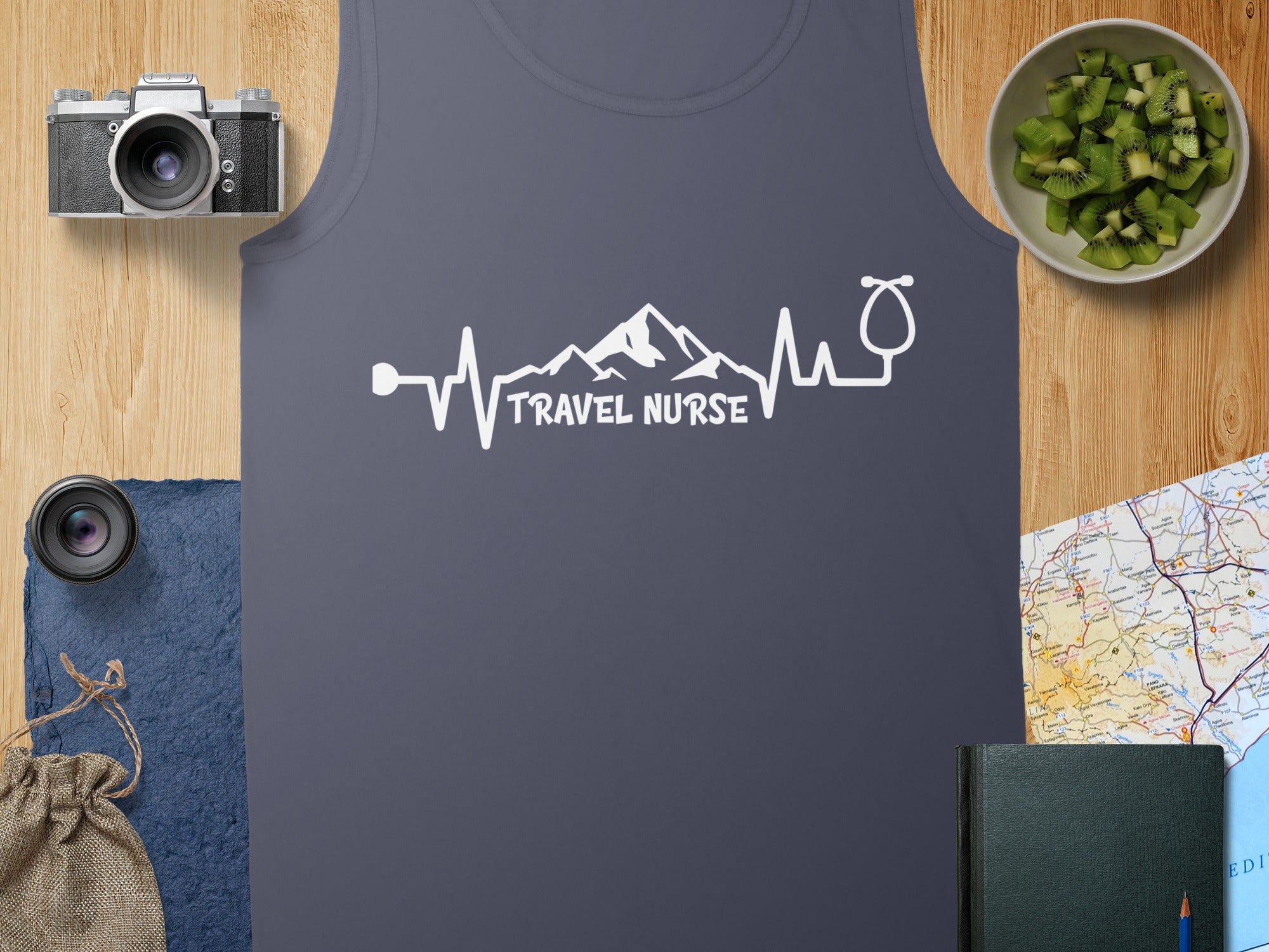 Dark grey tank top with "TRAVEL NURSE" and heartbeat graphic.