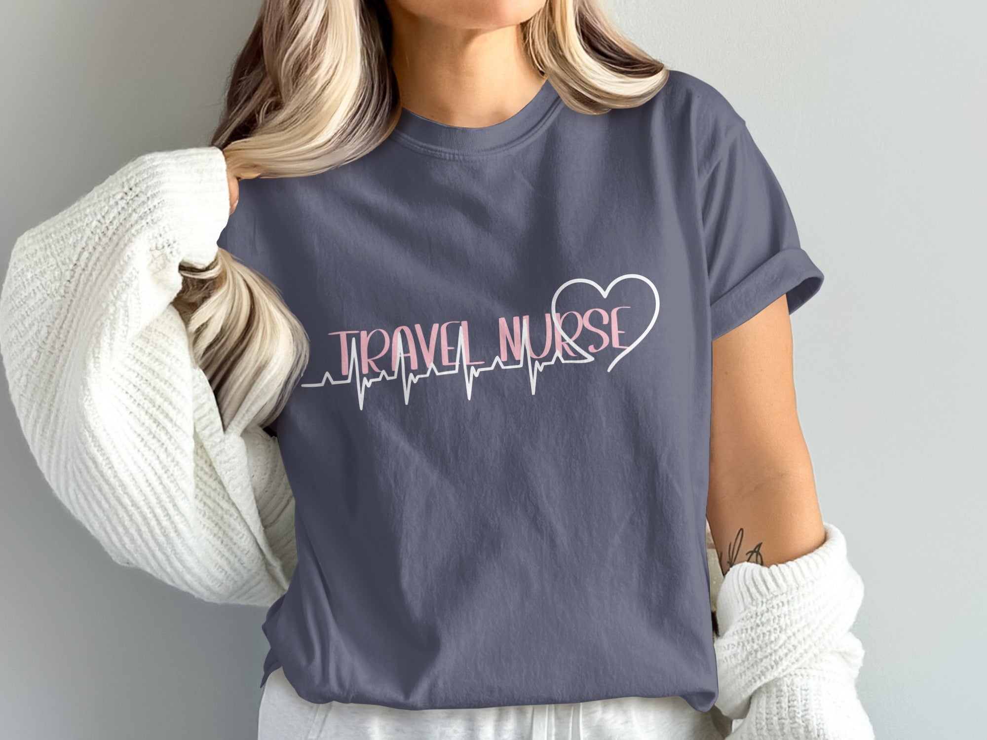 Dark blue t-shirt with "TRAVEL NURSE" and a heart ECG design.