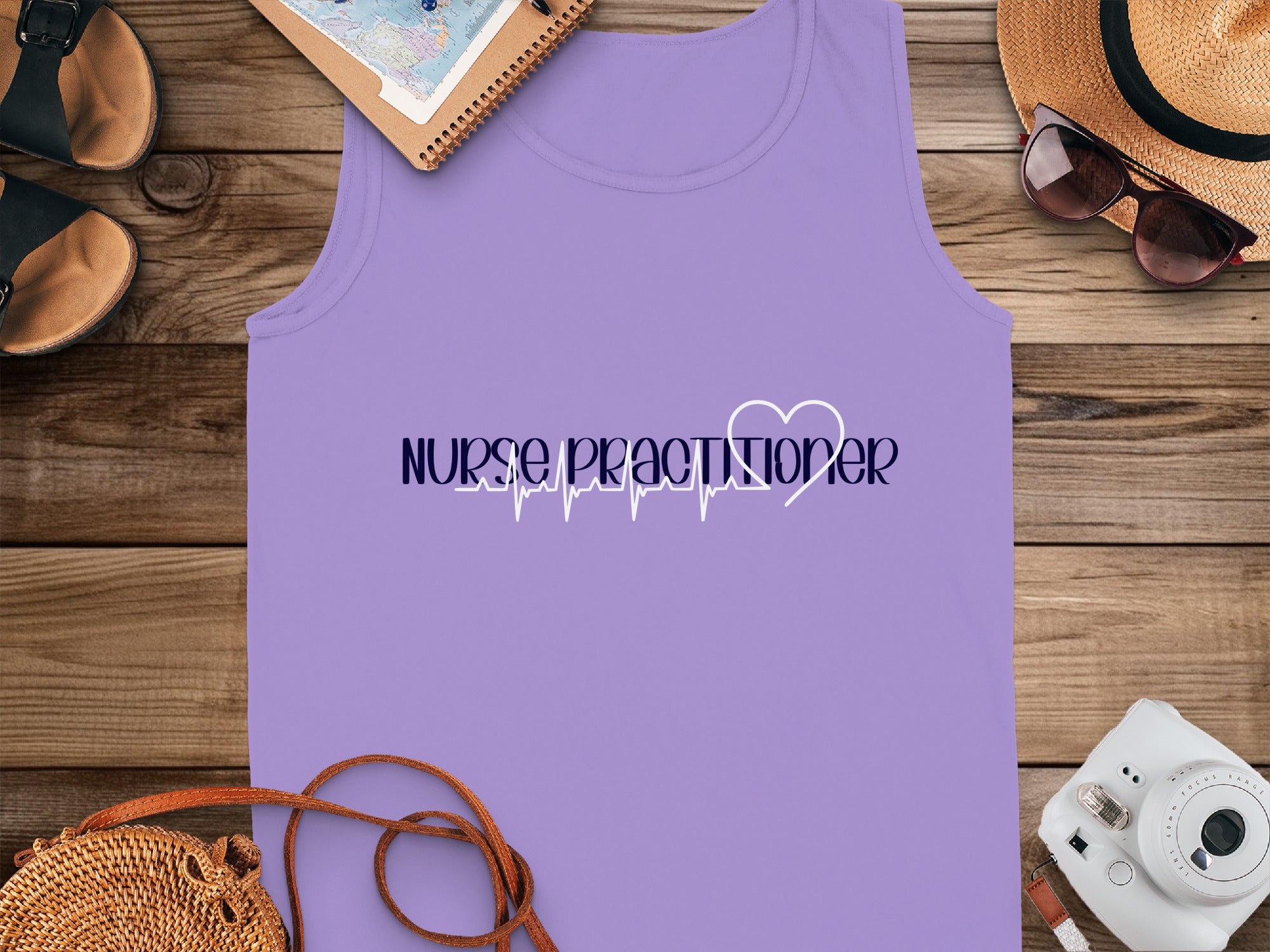 Purple tank top with "Nurse Practitioner" and heartbeat graphic.