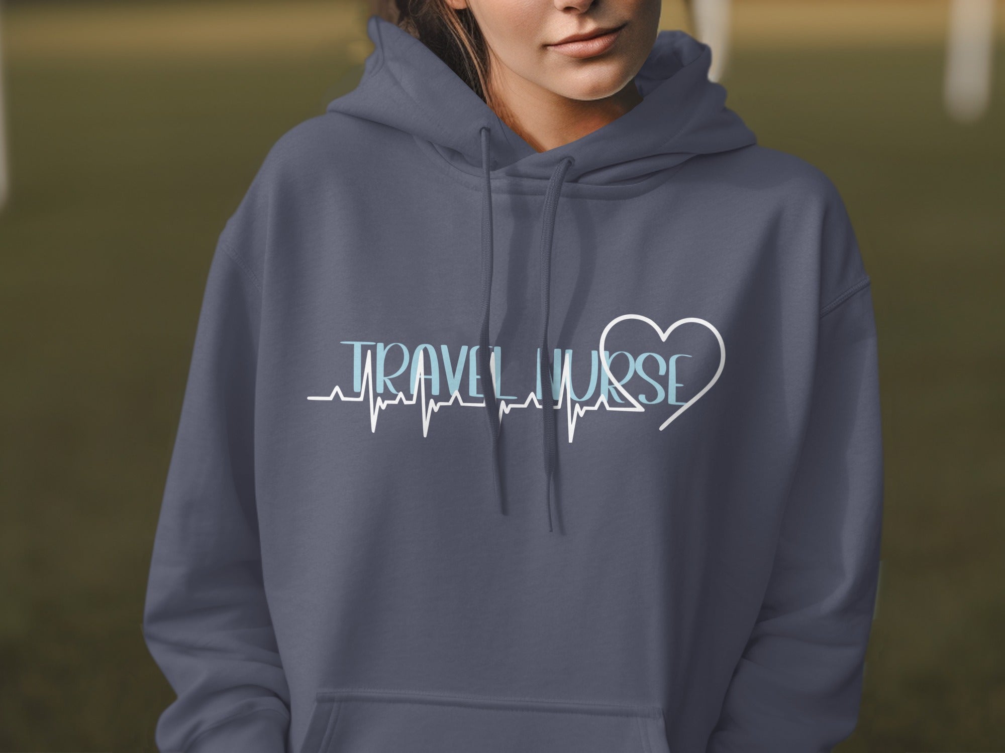 Dark blue hoodie with "TRAVEL NURSE" text and heart graphic.