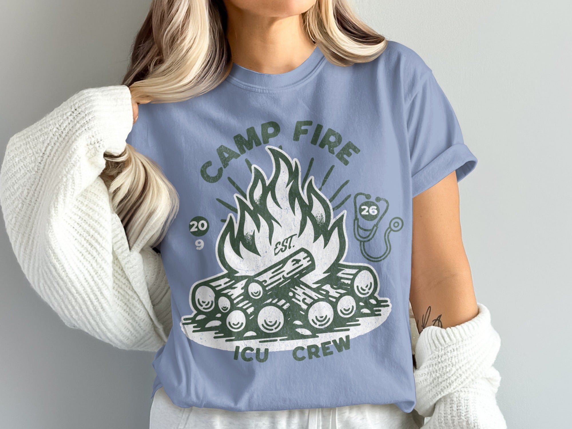 Camp Fire ICU Crew t-shirt with a bonfire and stethoscope logo.