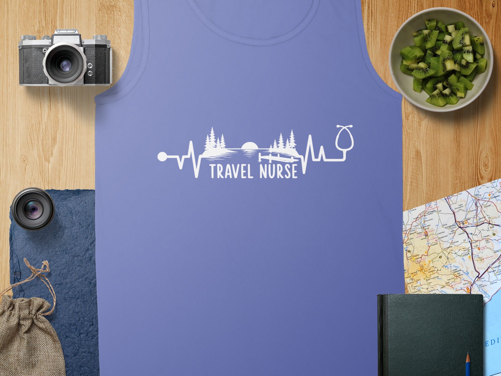 Purple tank top with "Travel Nurse" stethoscope heart rate graphic.