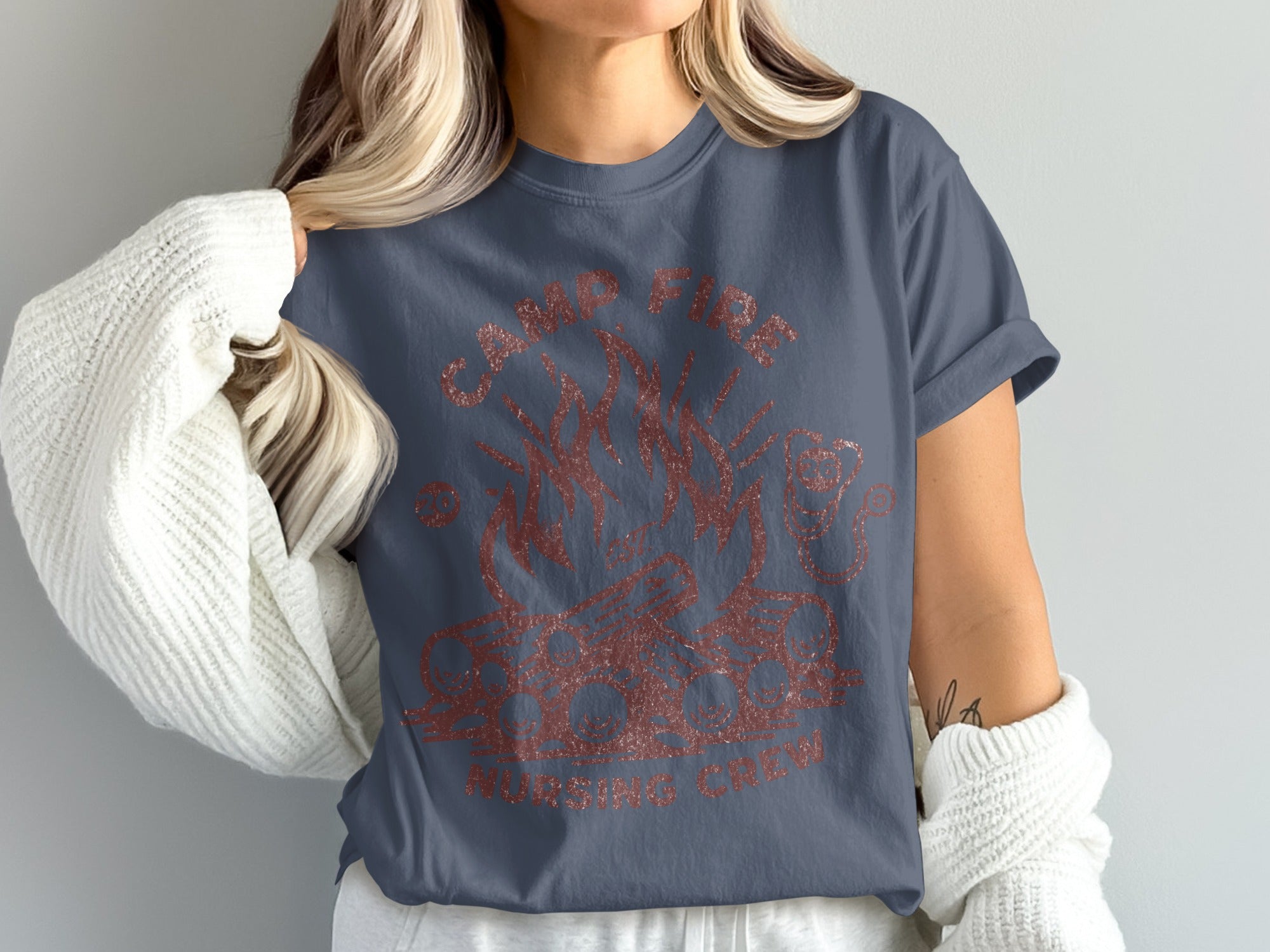 Dark blue t-shirt with "Camp Fire Nursing Crew" and a campfire graphic.
