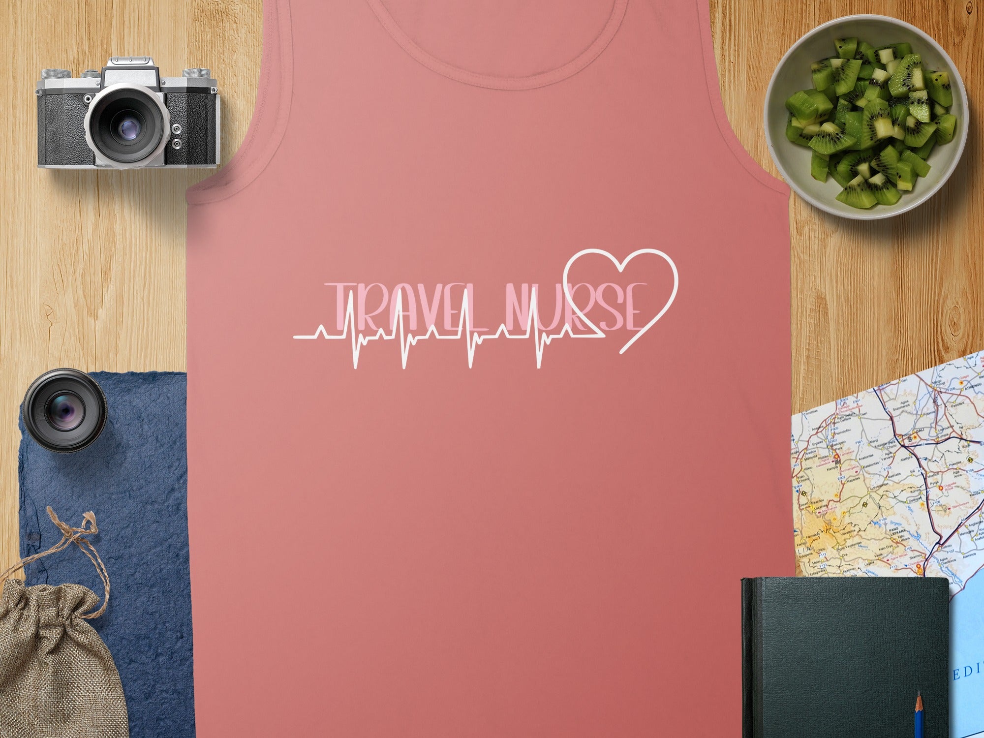 Coral tank top with "Travel Nurse" heartbeat graphic and a travel map.