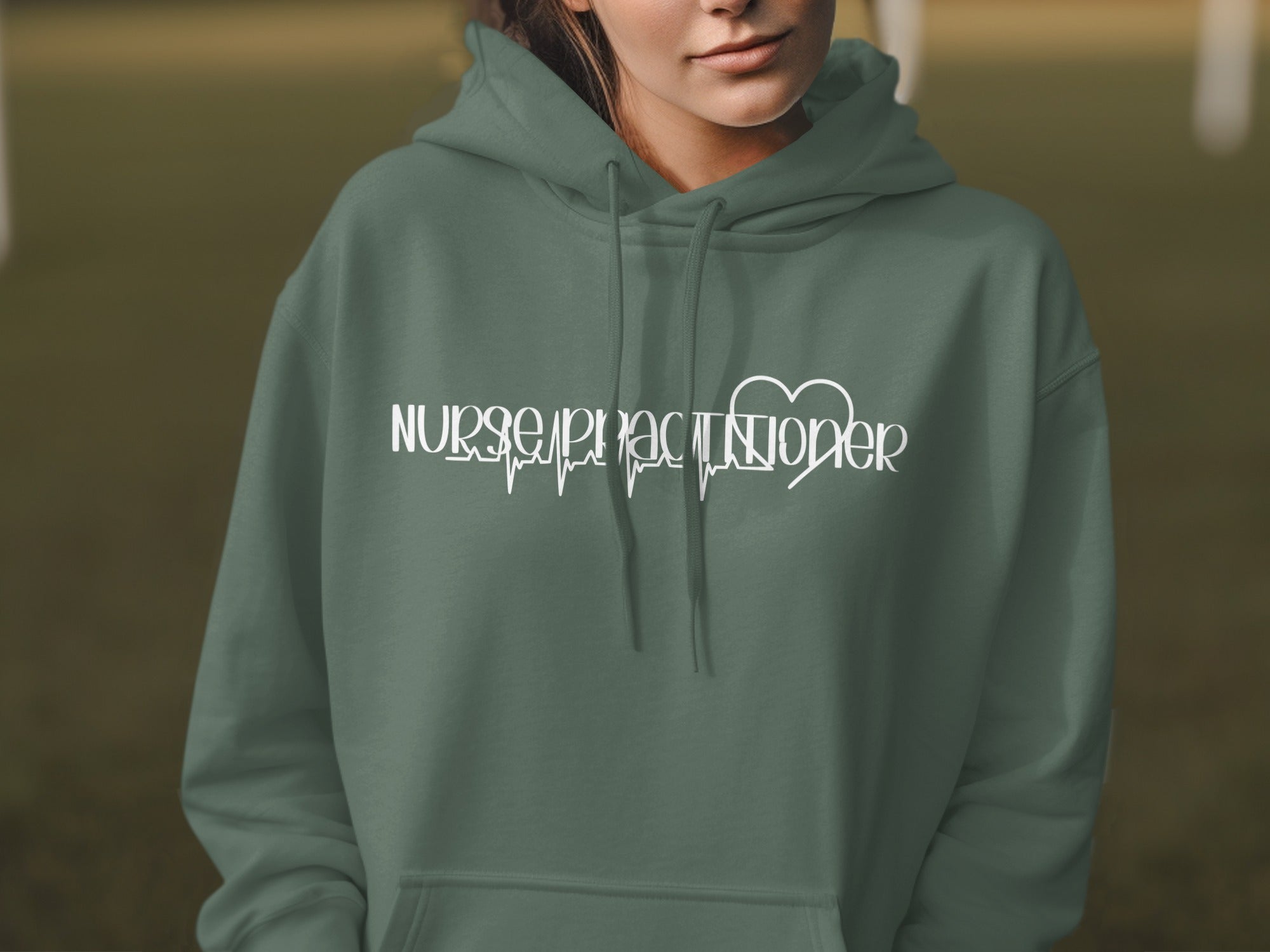 Green hoodie with "Nurse Practitioner" and a heartbeat line graphic.
