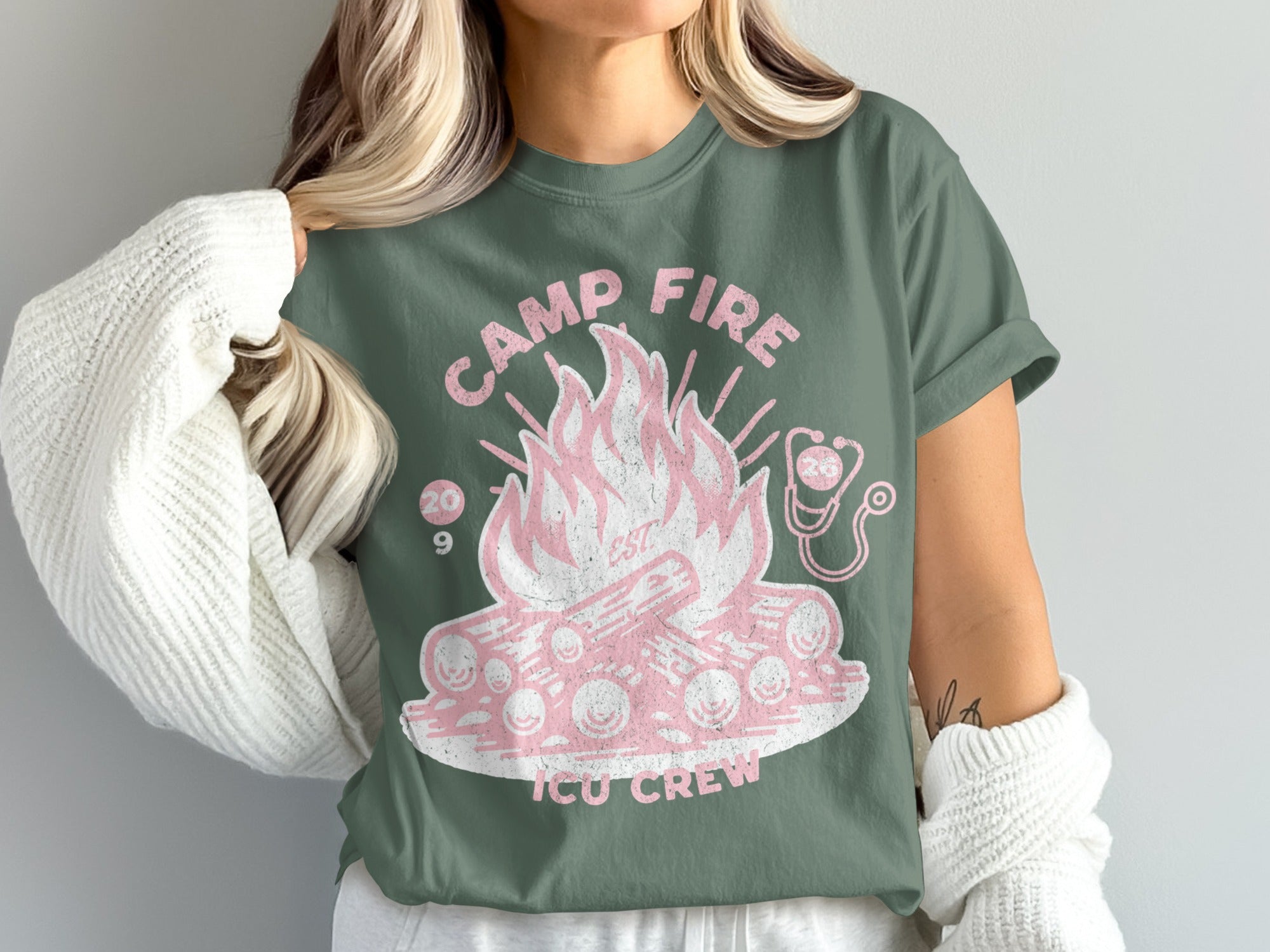 Camp Fire EST 2019 ICU Crew graphic t-shirt with pink flames and logs.