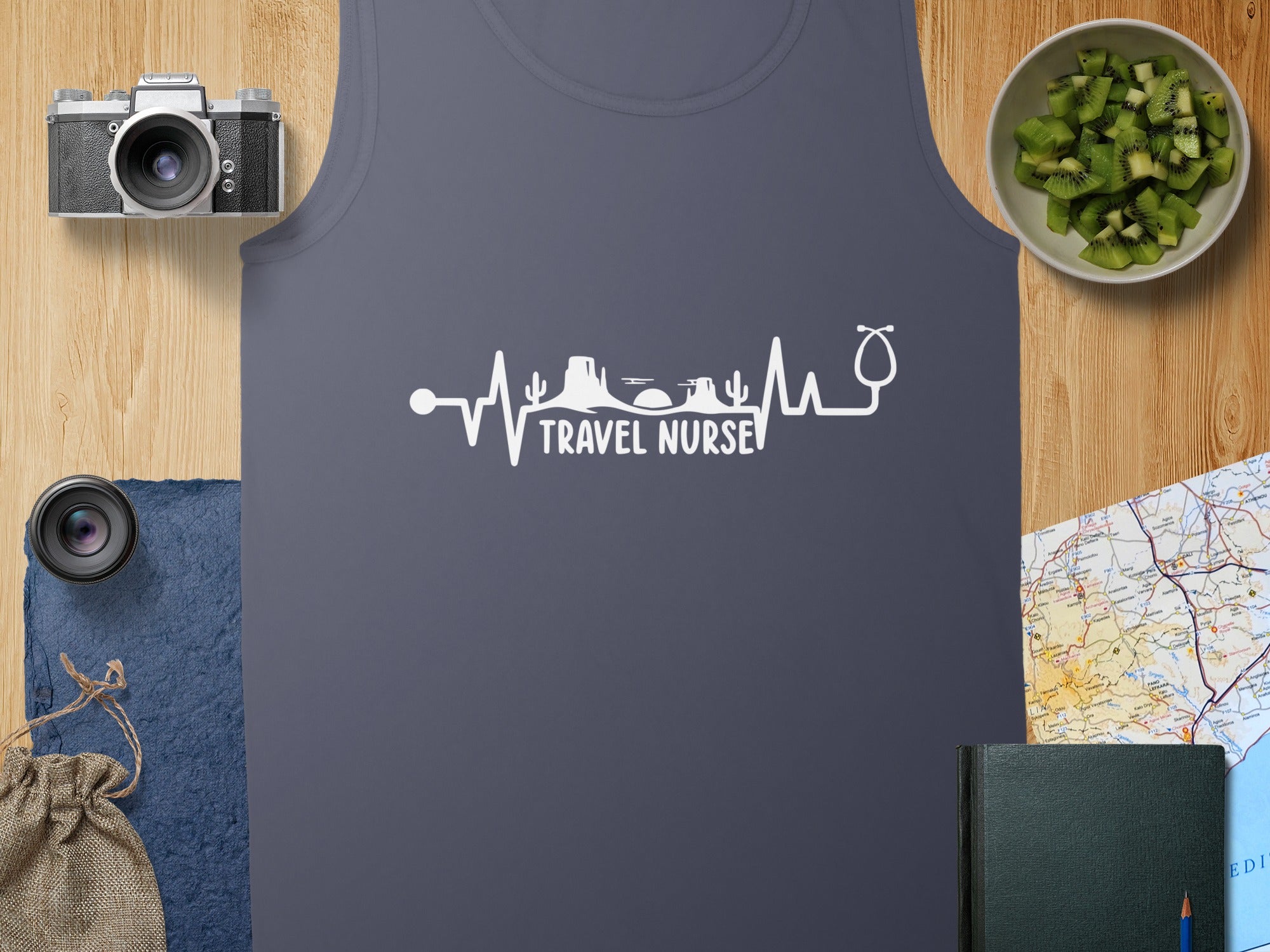 Dark gray tank top with "TRAVEL NURSE" electrocardiogram design.