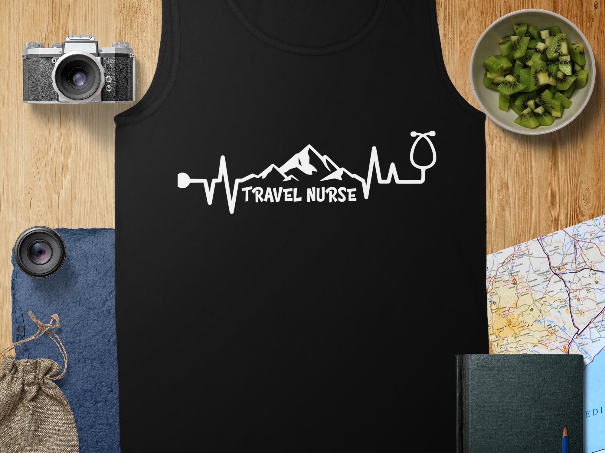 Black tank top with "Travel Nurse" text and mountain heartbeat design.