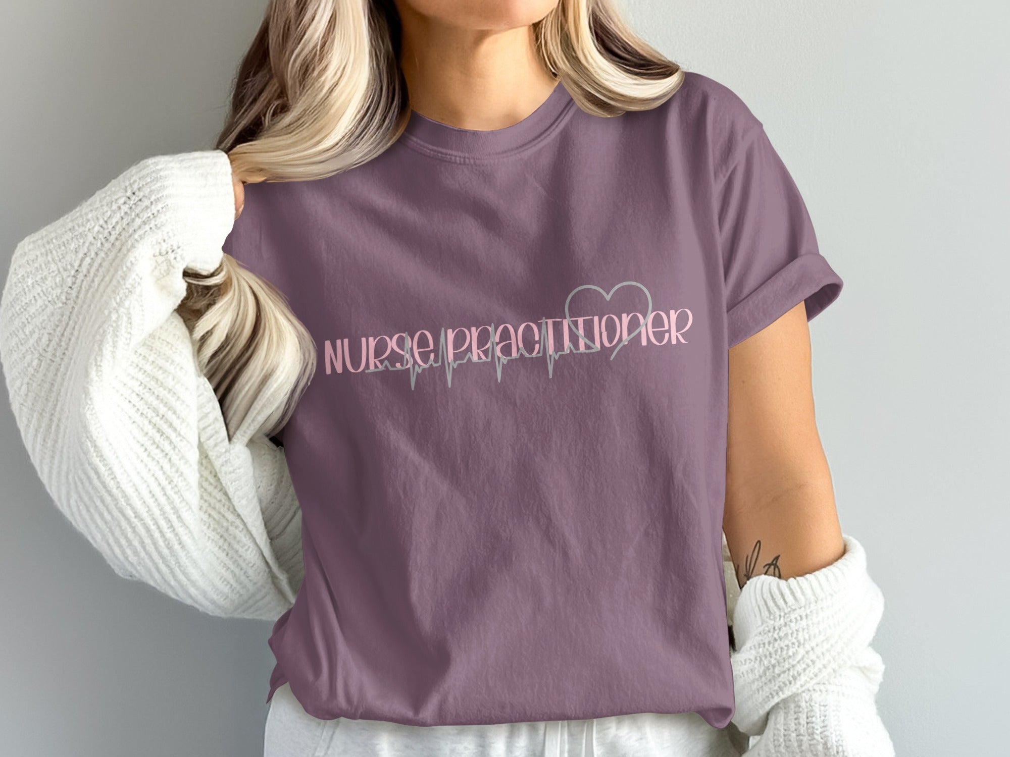 Nurse Practitioner t-shirt with heart rate graphic and text.