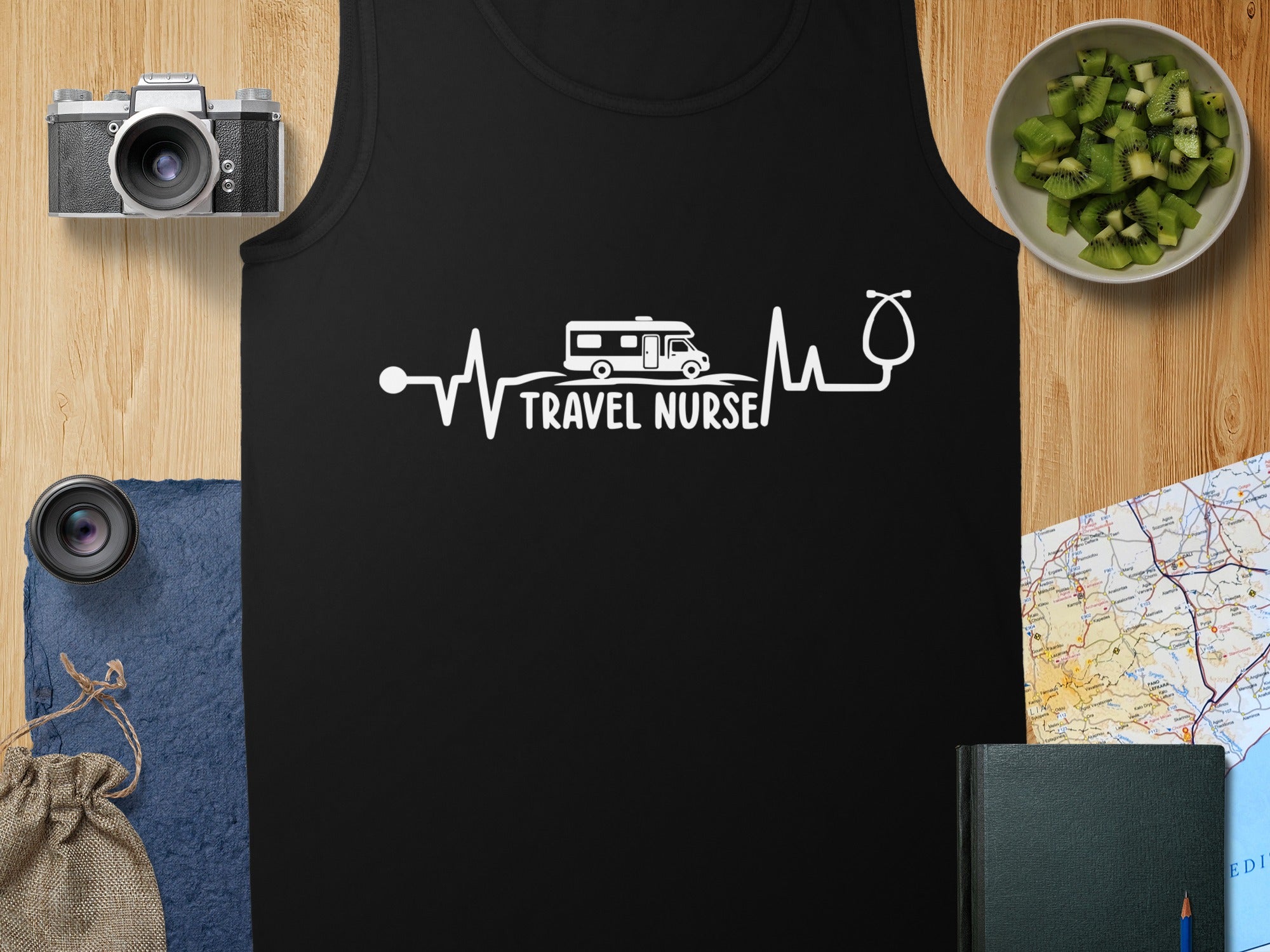 Black tank top with "Travel Nurse" electrocardiogram graphic and a stethoscope.