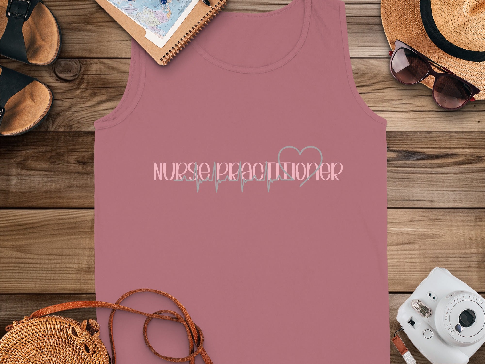 Pink tank top with "Nurse Practitioner" text and heartbeat graphic.