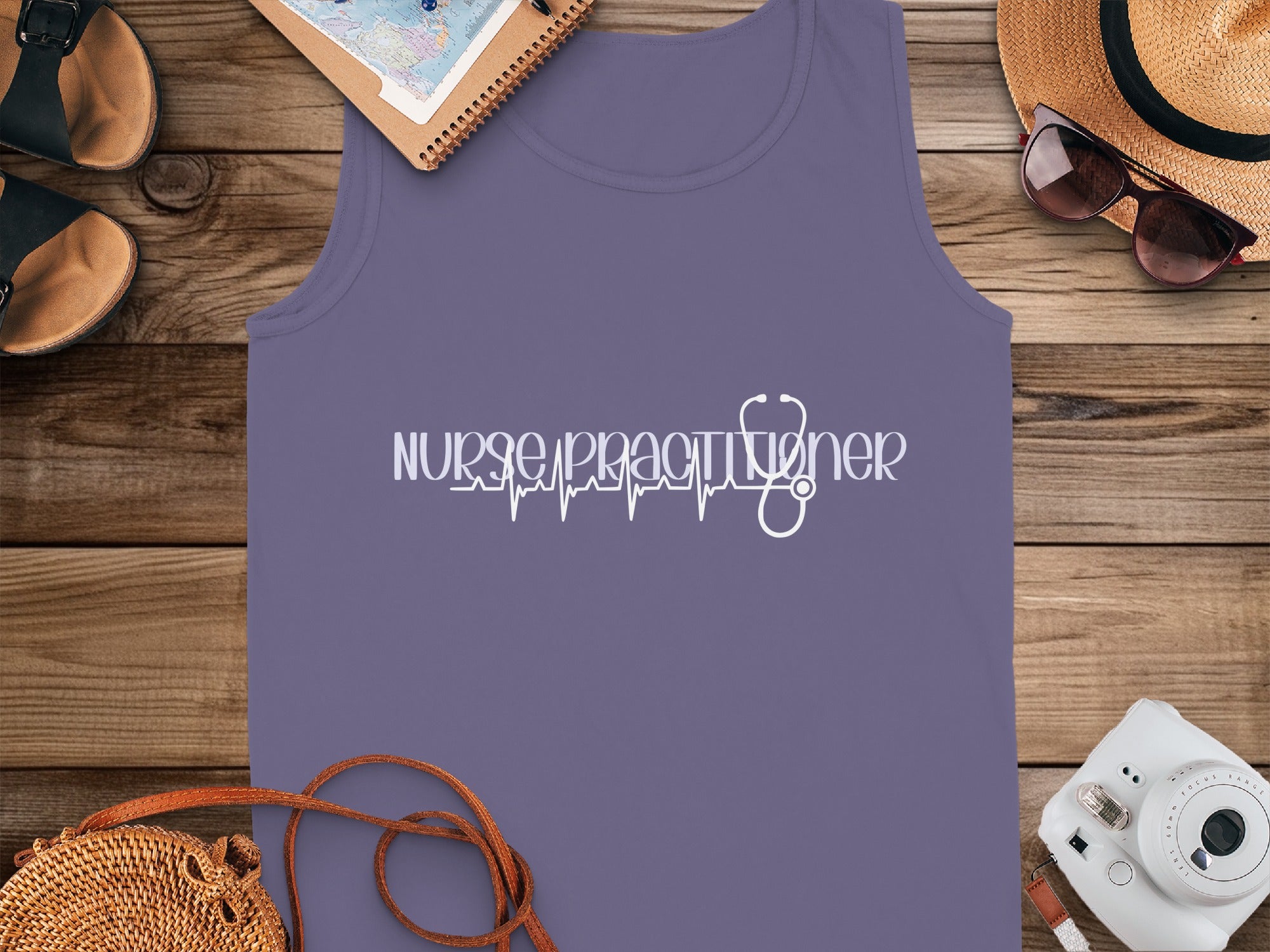 Purple tank top with "Nurse Practitioner" and stethoscope heartbeat graphic.