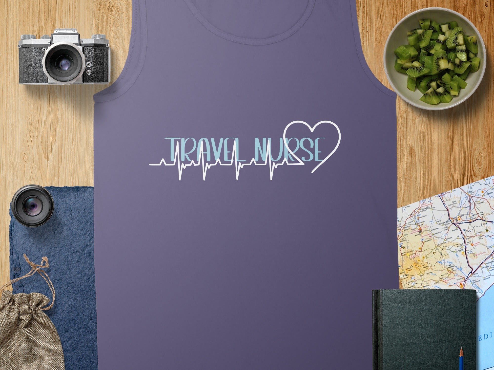 Purple tank top with "TRAVEL NURSE" text and a heart pulse line.
