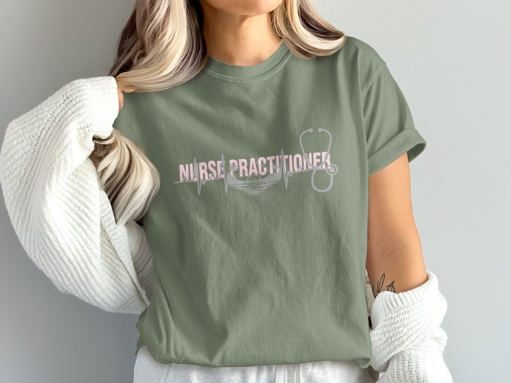 Green t-shirt with "Nurse Practitioner" text and stethoscope graphic.