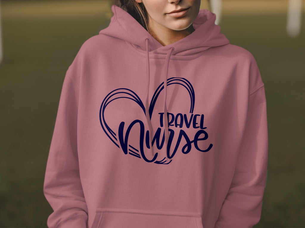 Pink hoodie with "Travel Nurse" text inside a heart outline.