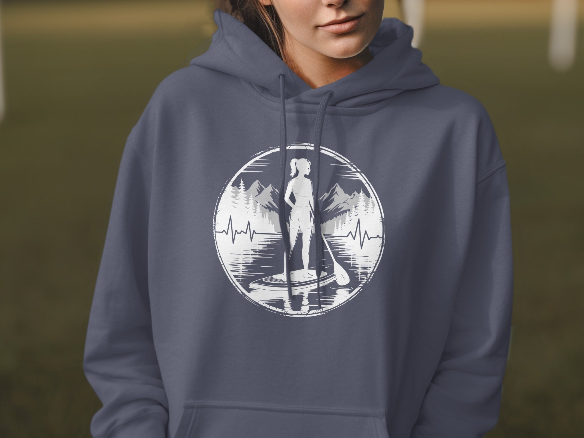 Navy hoodie with circular graphic of paddleboarder, mountains, and heartbeat.