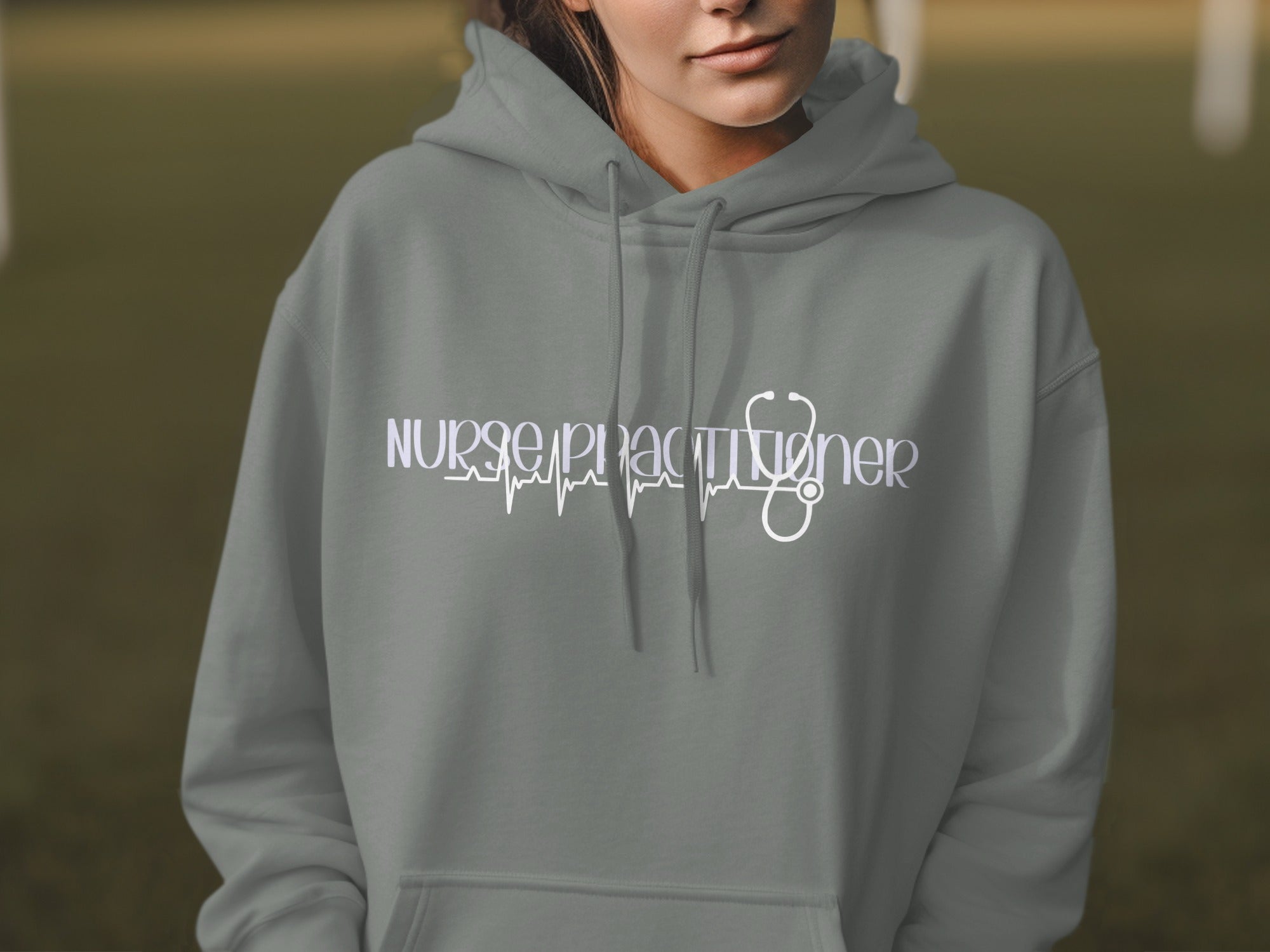 Grey hoodie with "Nurse Practitioner" and stethoscope electrocardiogram graphic.