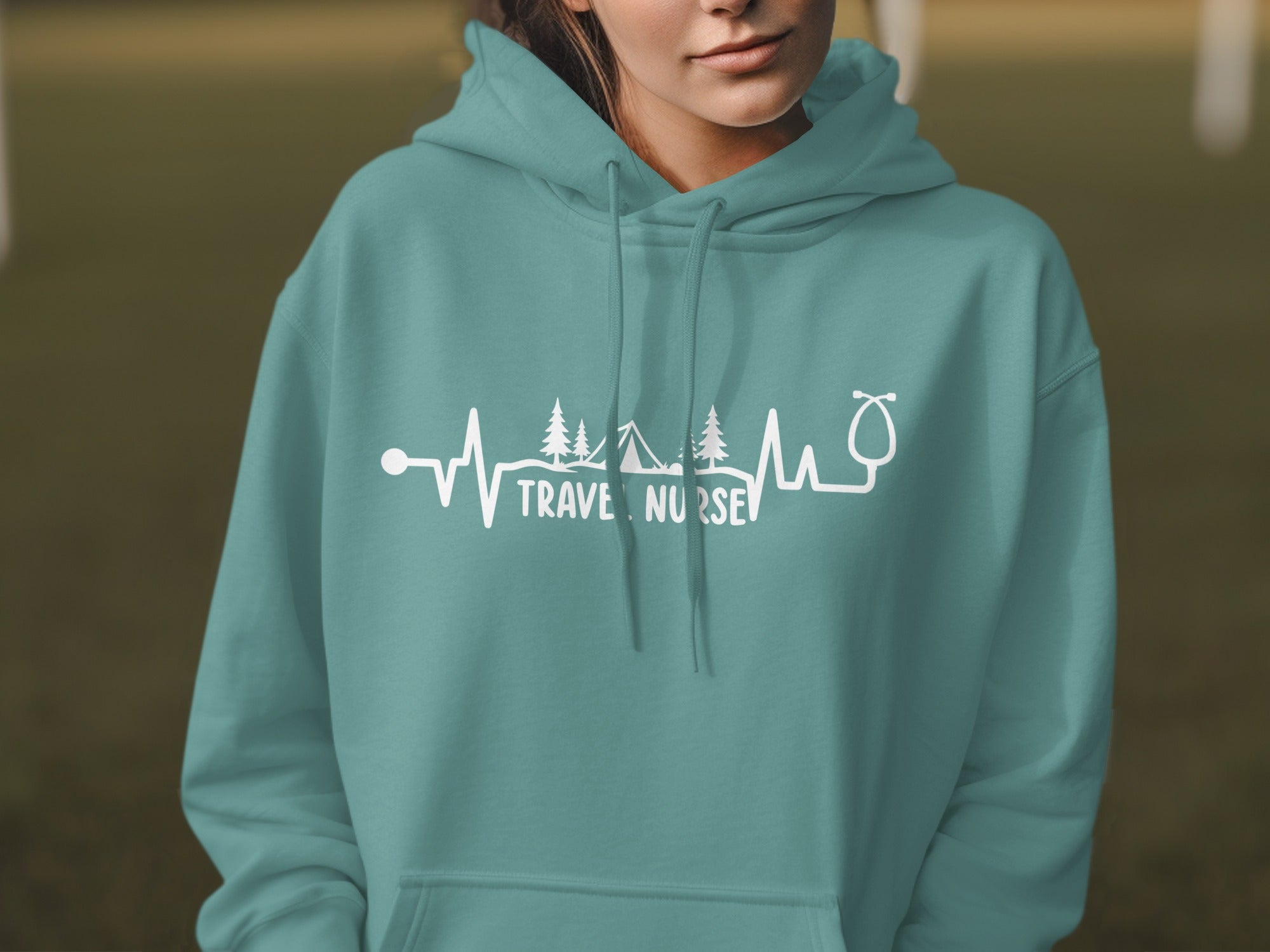 Teal hooded sweatshirt with "Travel Nurse" text and medical heartbeat graphic.