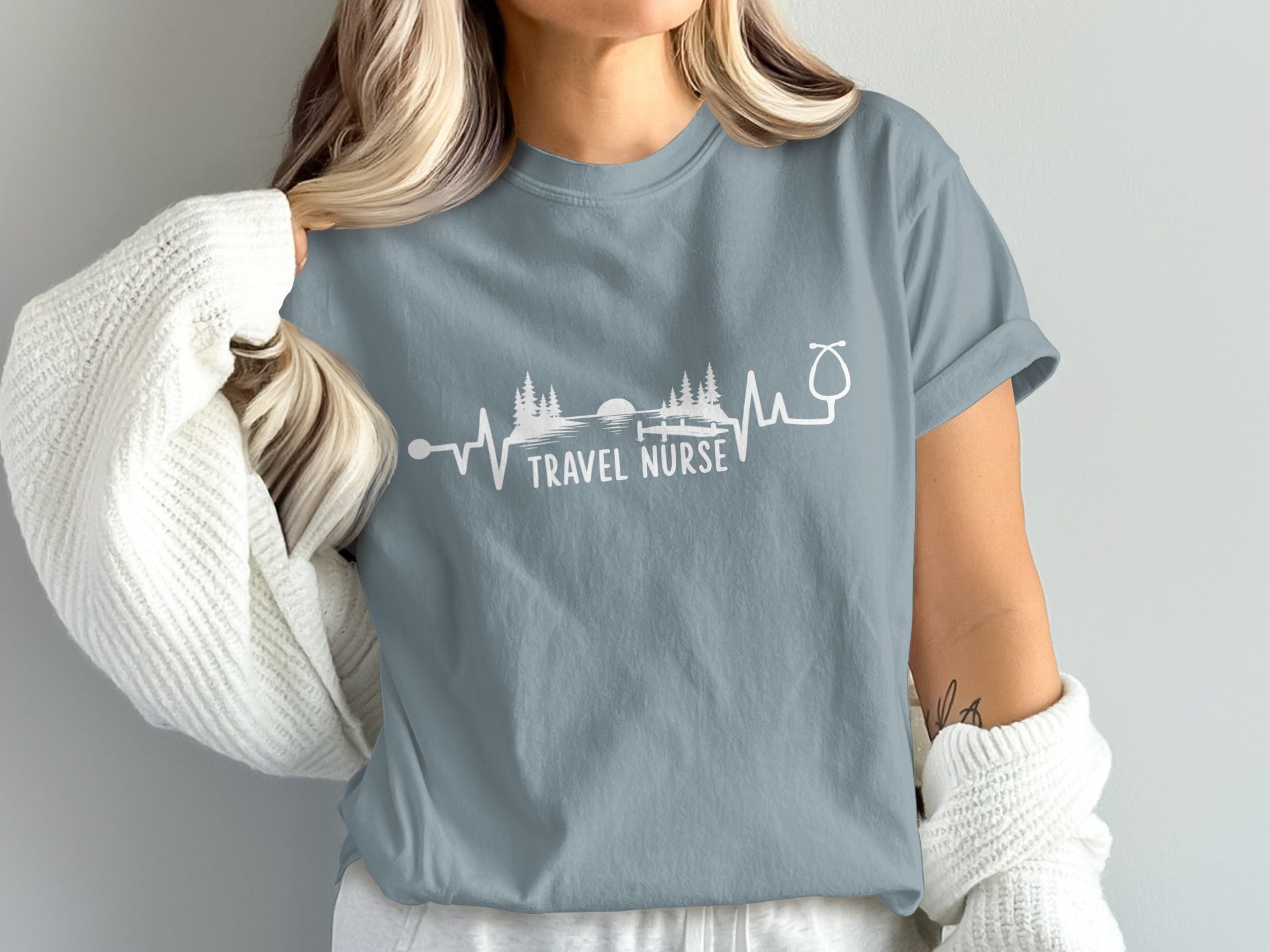 Gray t-shirt with "TRAVEL NURSE" text and heartbeat graphic.