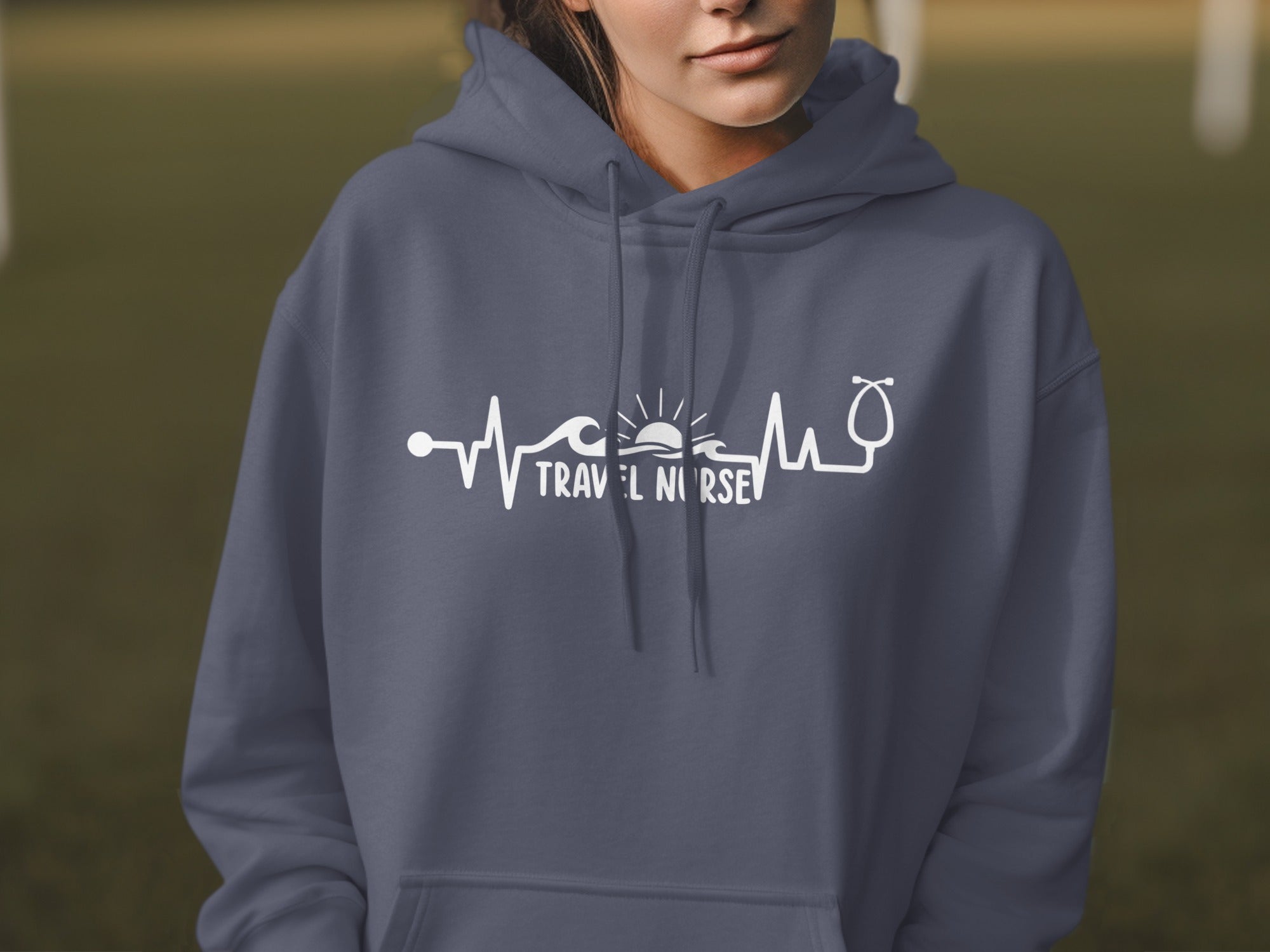 Navy hoodie with "TRAVEL NURSE" text and heartbeat graphic.