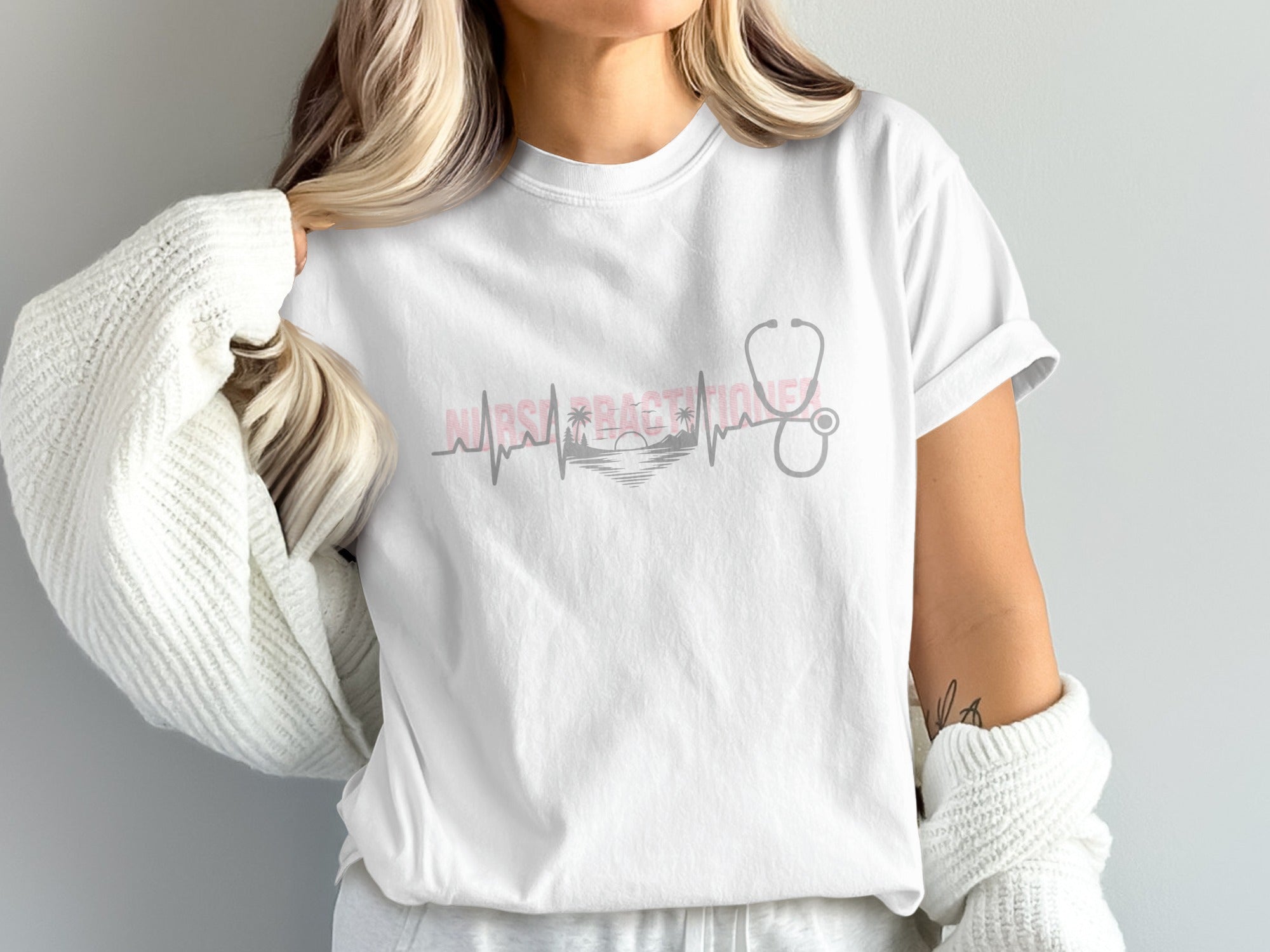 White t-shirt with "NURSE LIFE" text, heartbeat, stethoscope, and sunset.