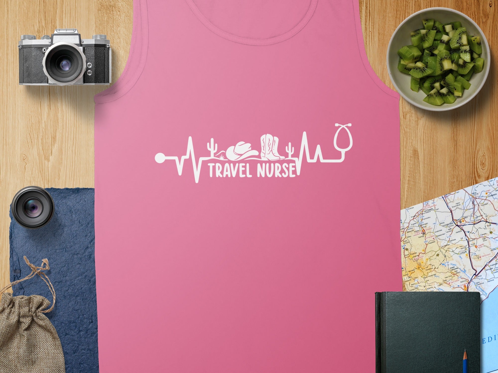 Pink tank top with "Travel Nurse" text and heartbeat graphic.