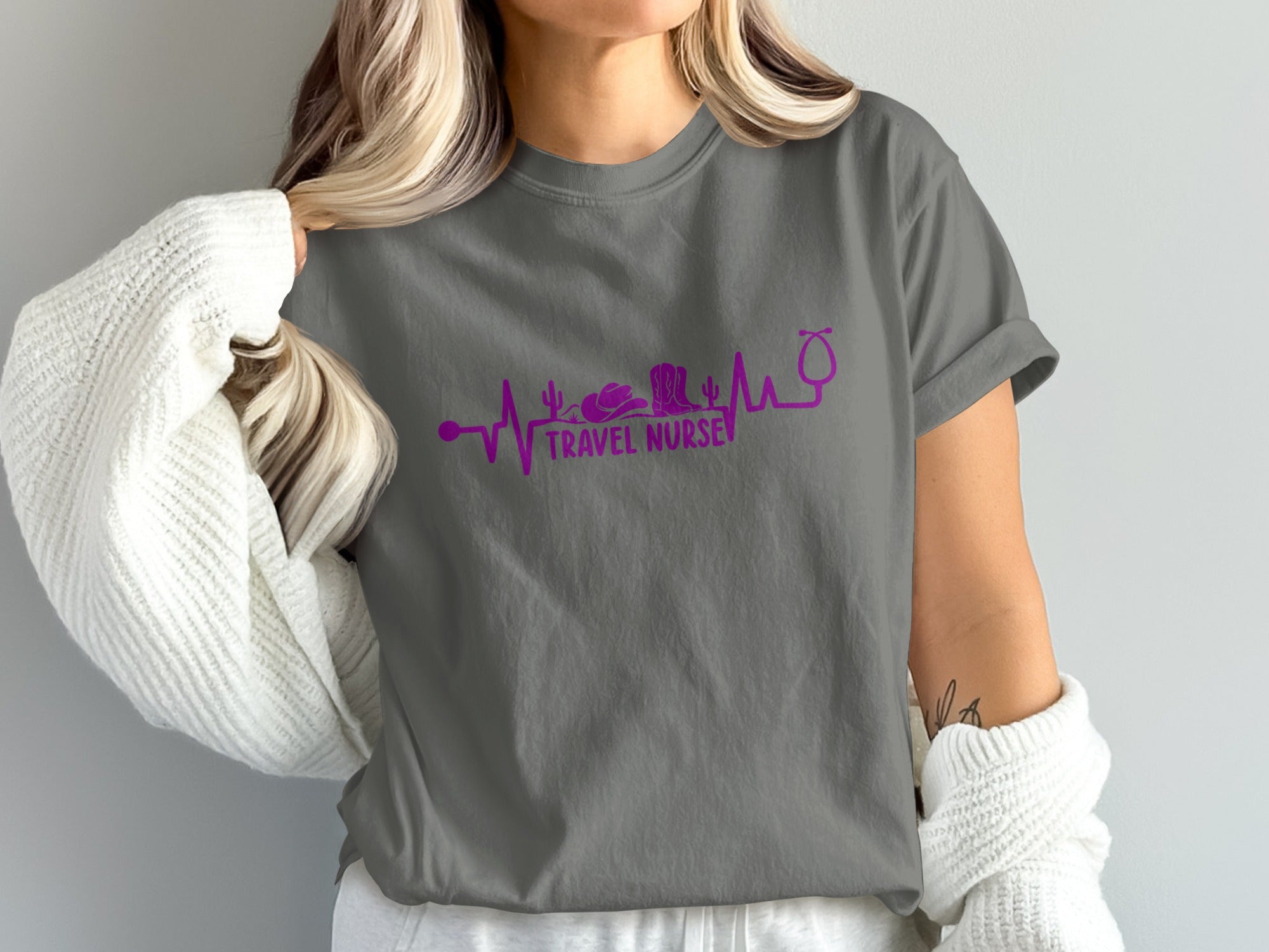 Grey t-shirt with purple stethoscope, cowboy hat, and cactus heartbeat graphic.