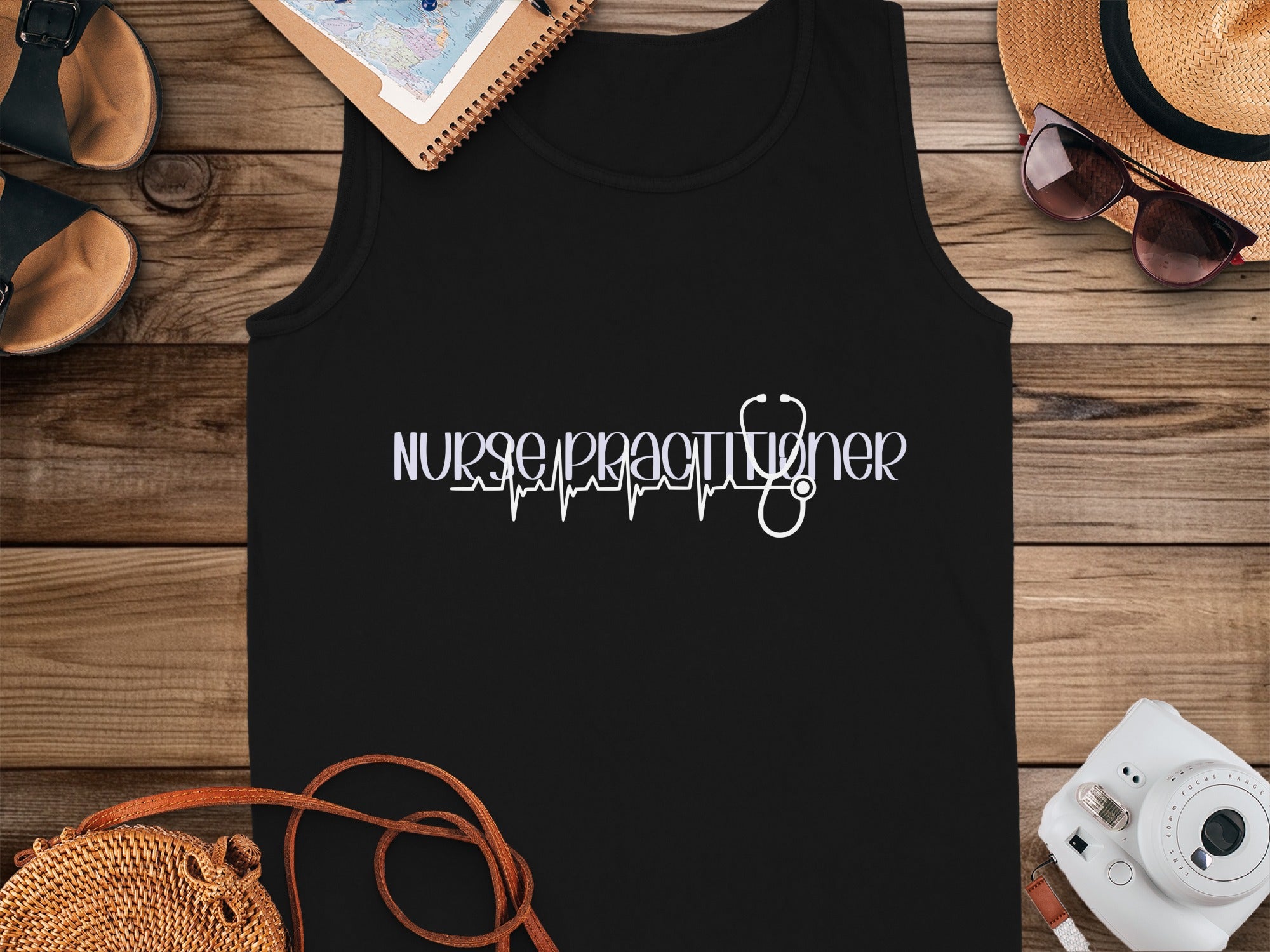 Black tank top with "Nurse Practitioner" text and a stethoscope heartbeat graphic.