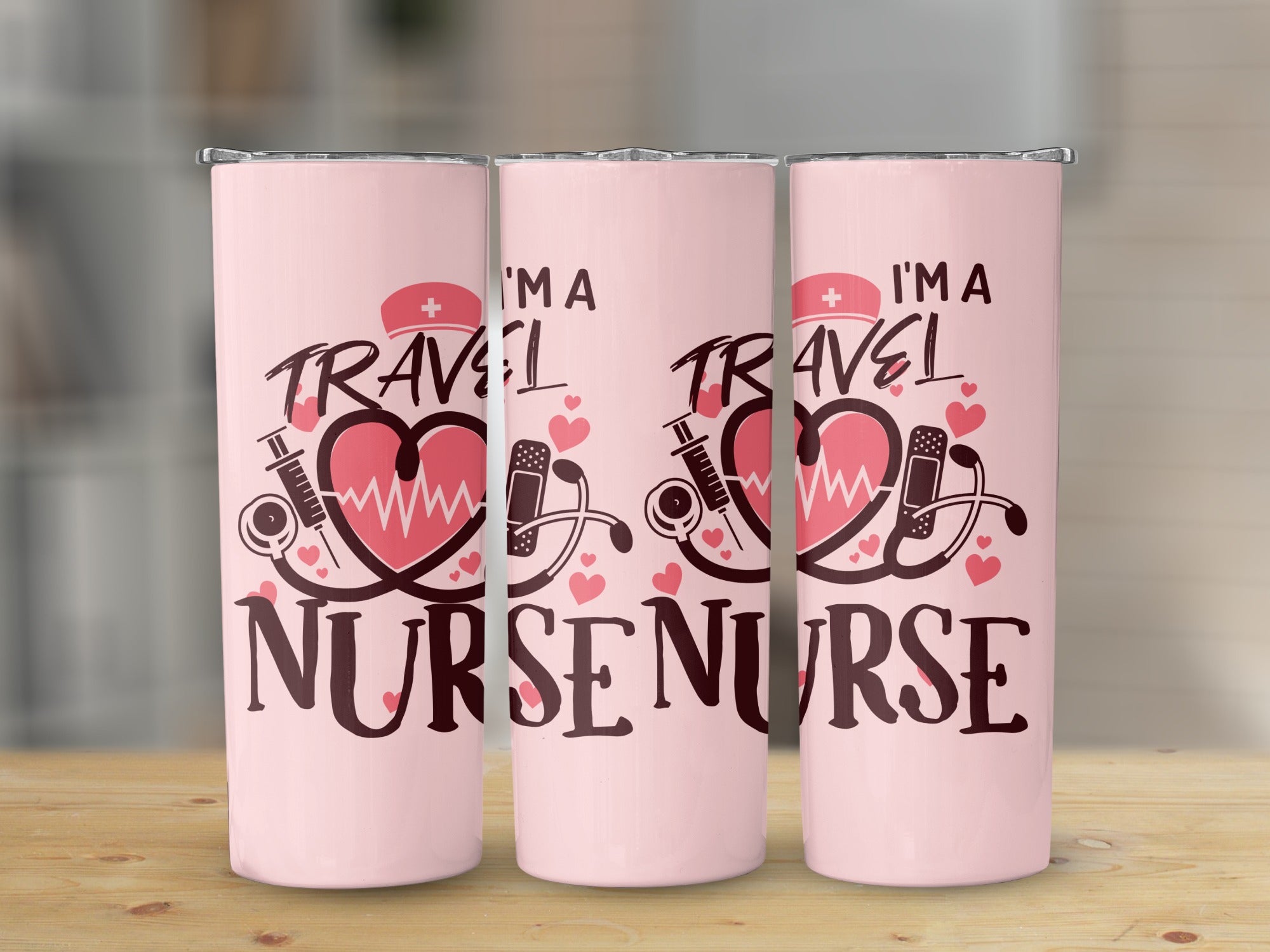Pink tumbler with "I'm a Travel Nurse" text and medical graphics.