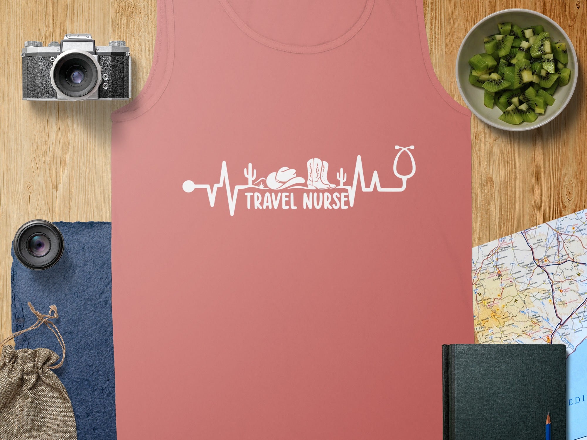 Pink tank top with "Travel Nurse" in a heartbeat line graphic.