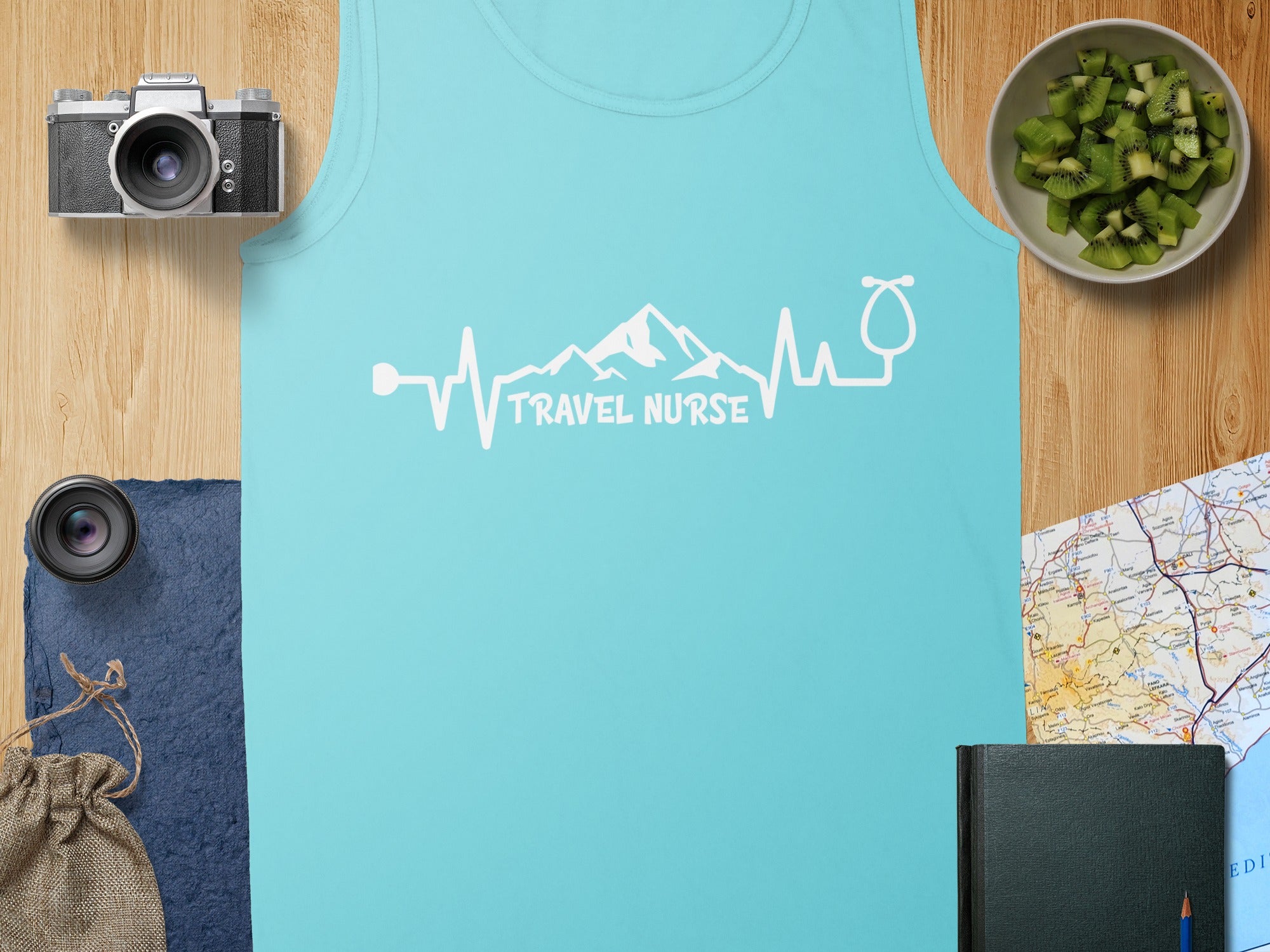 Light blue tank top with "Travel Nurse" electrocardiogram and stethoscope graphic.