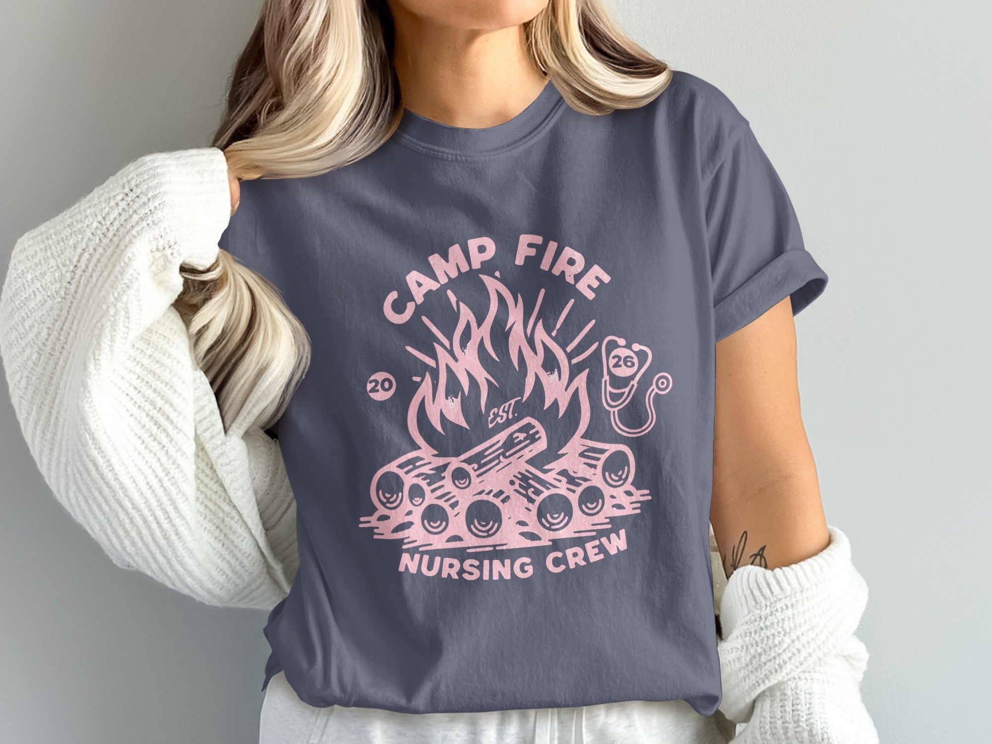 Dark grey t-shirt with "Camp Fire Nursing Crew" text and campfire graphic.