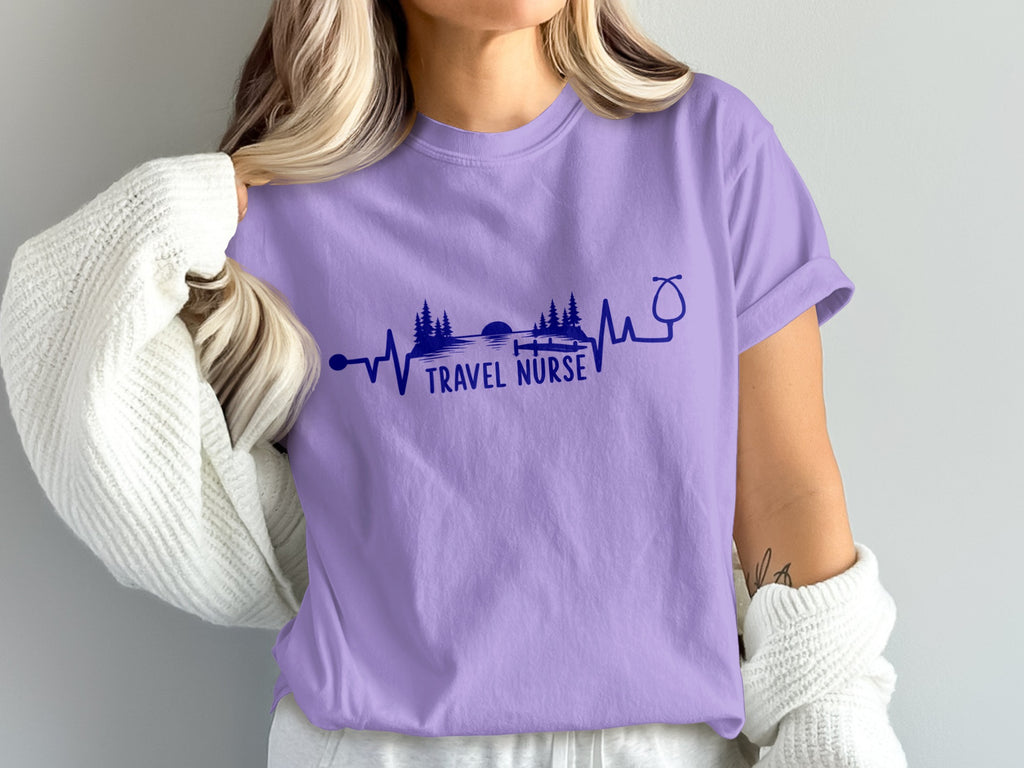 Purple t-shirt with "Travel Nurse" text and a landscape heartbeat design.