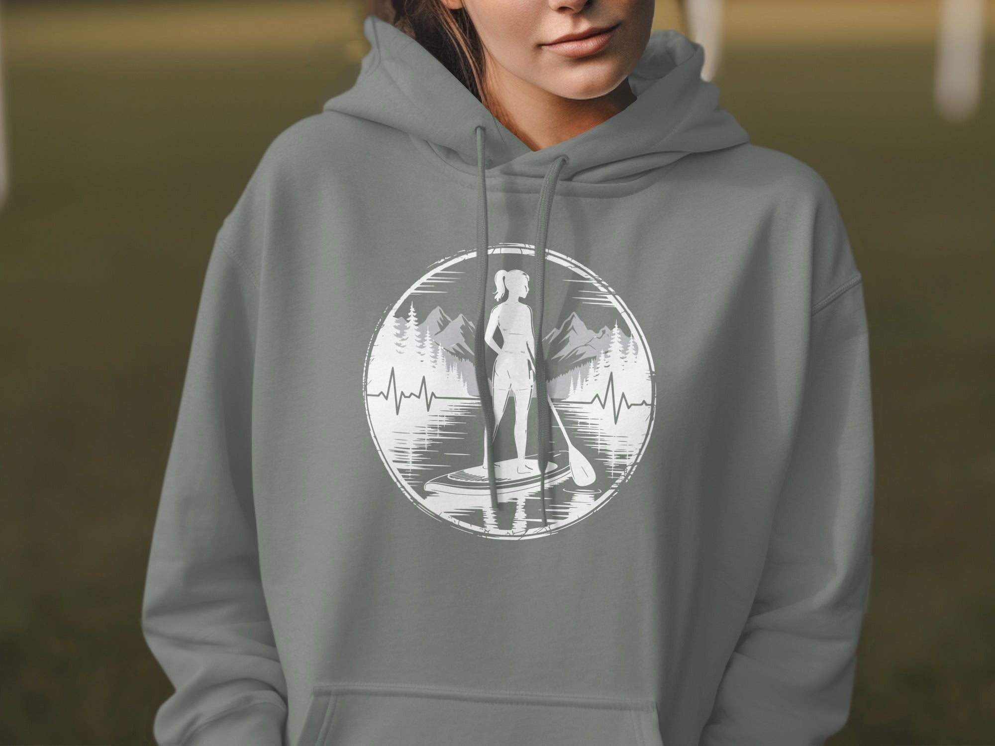 Gray hoodie with paddleboarder silhouette and mountain landscape in circle logo.