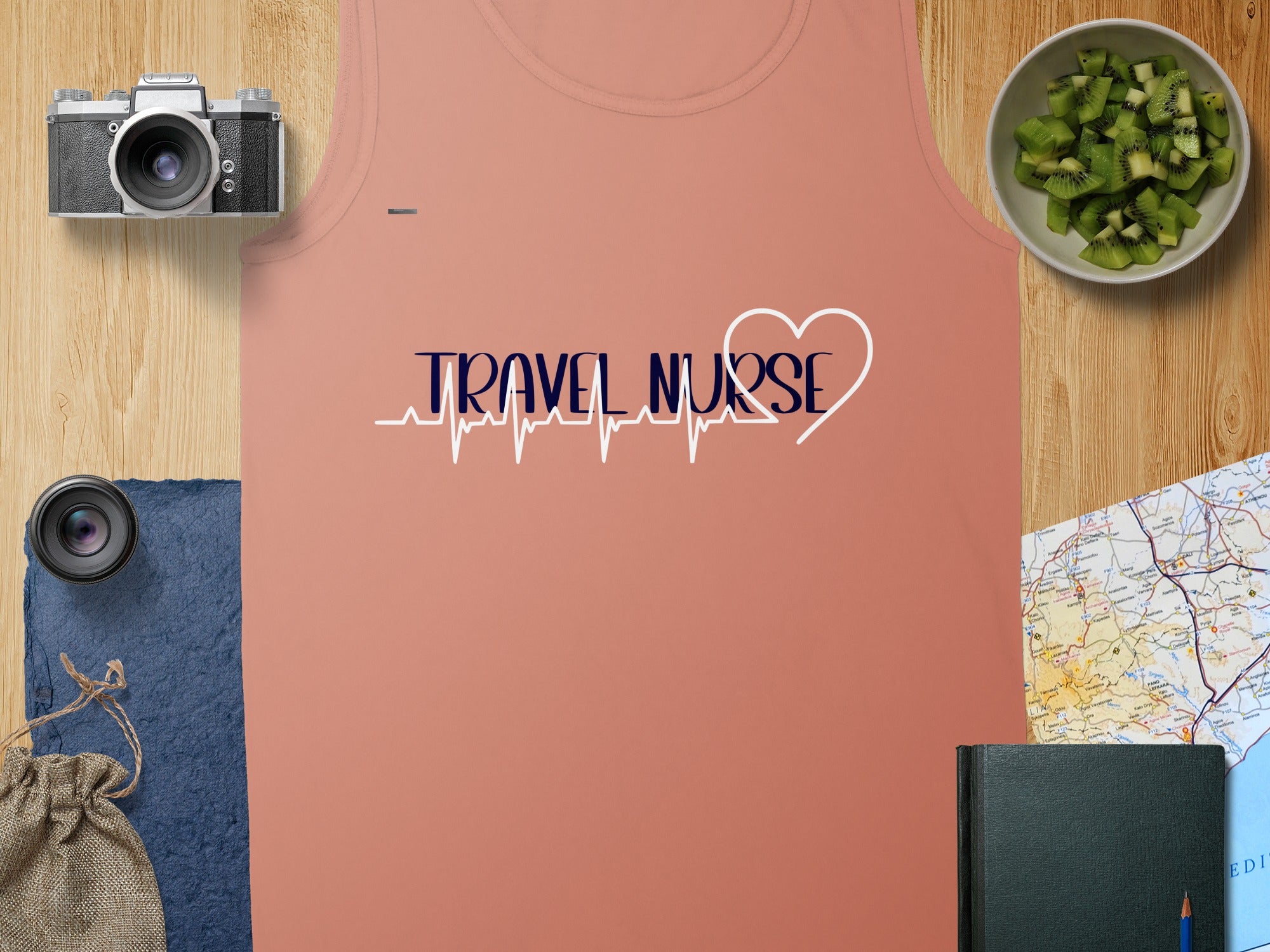 Coral tank top with "Travel Nurse" text and heart-shaped EKG.