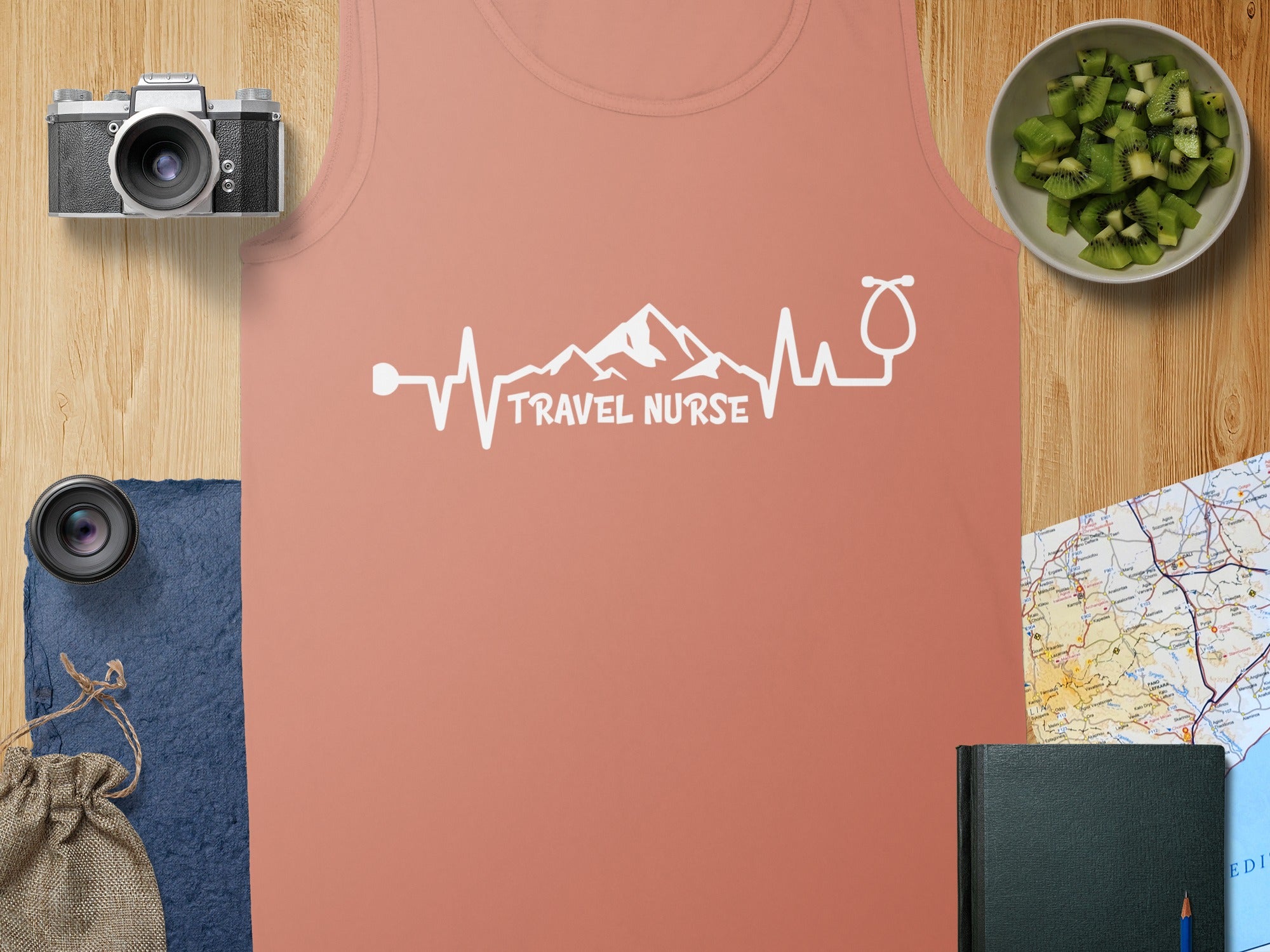 Peach tank top with "TRAVEL NURSE" text and heartbeat graphic.