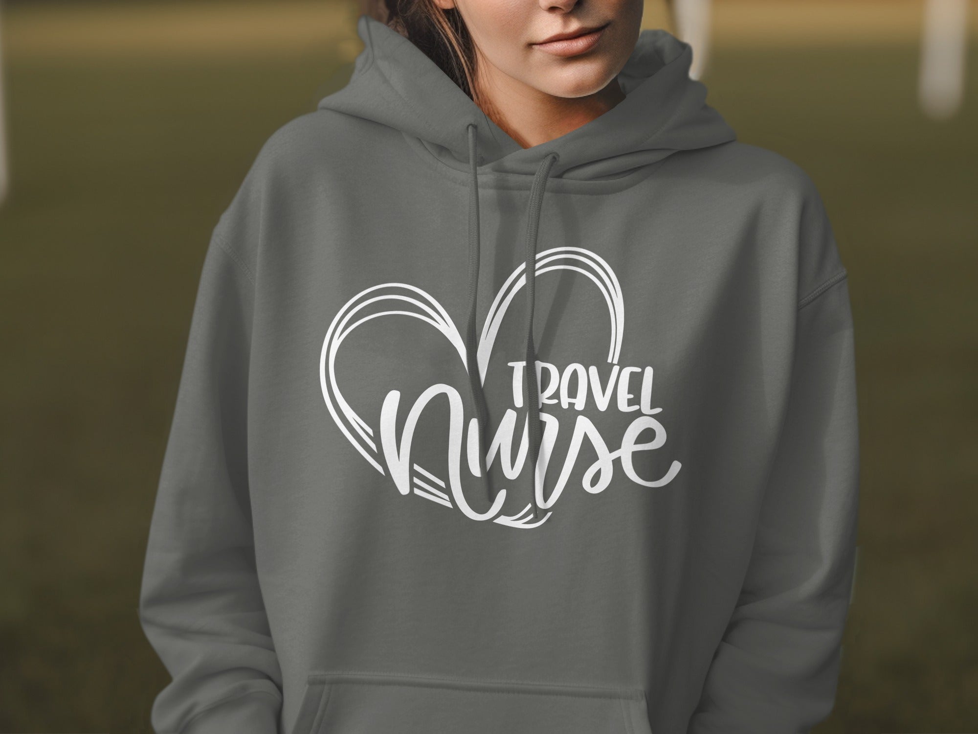 Gray hoodie with "Travel Nurse" text inside a heart outline.