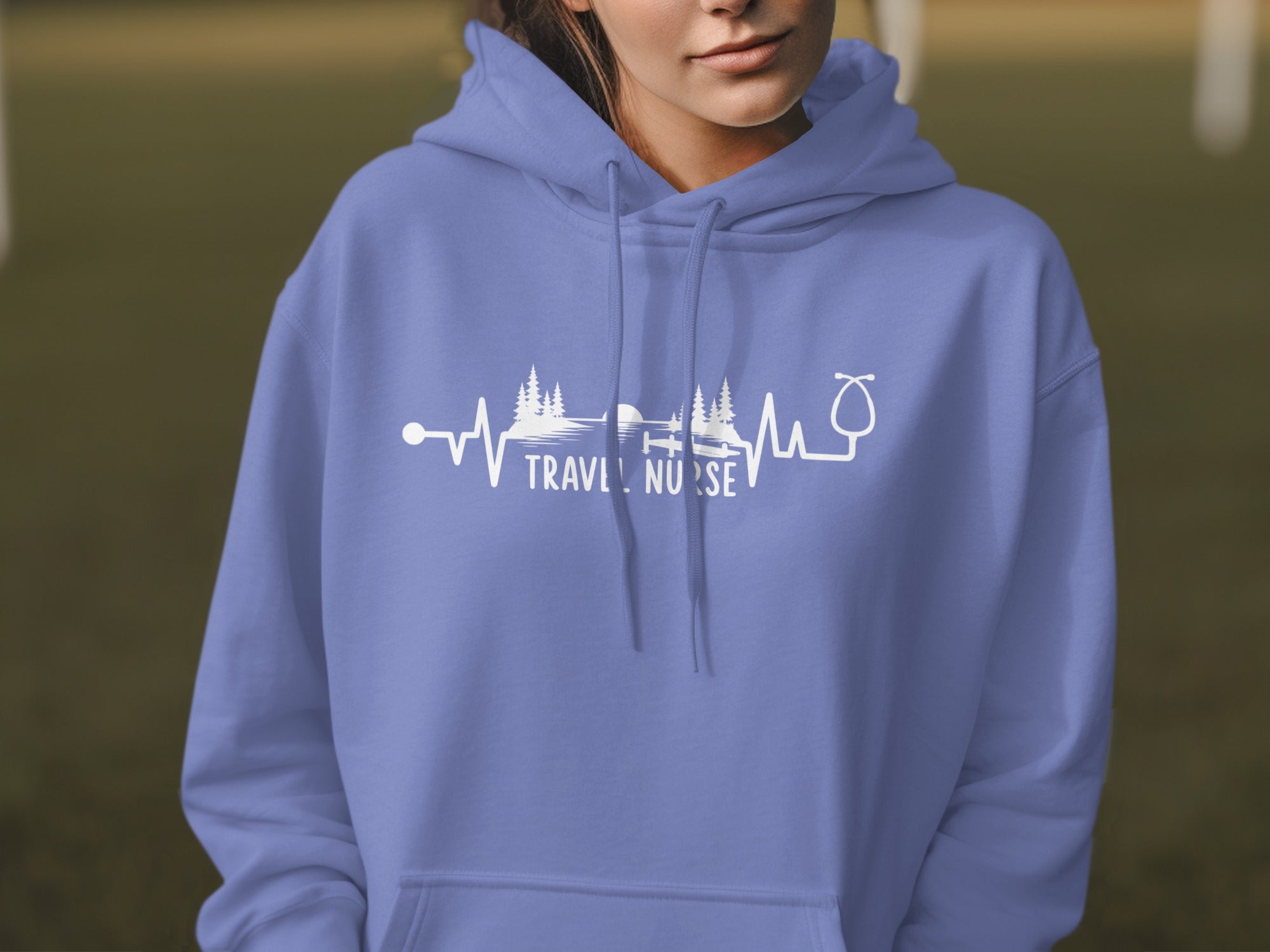Purple hoodie with white "Travel Nurse" text and heartbeat graphic.