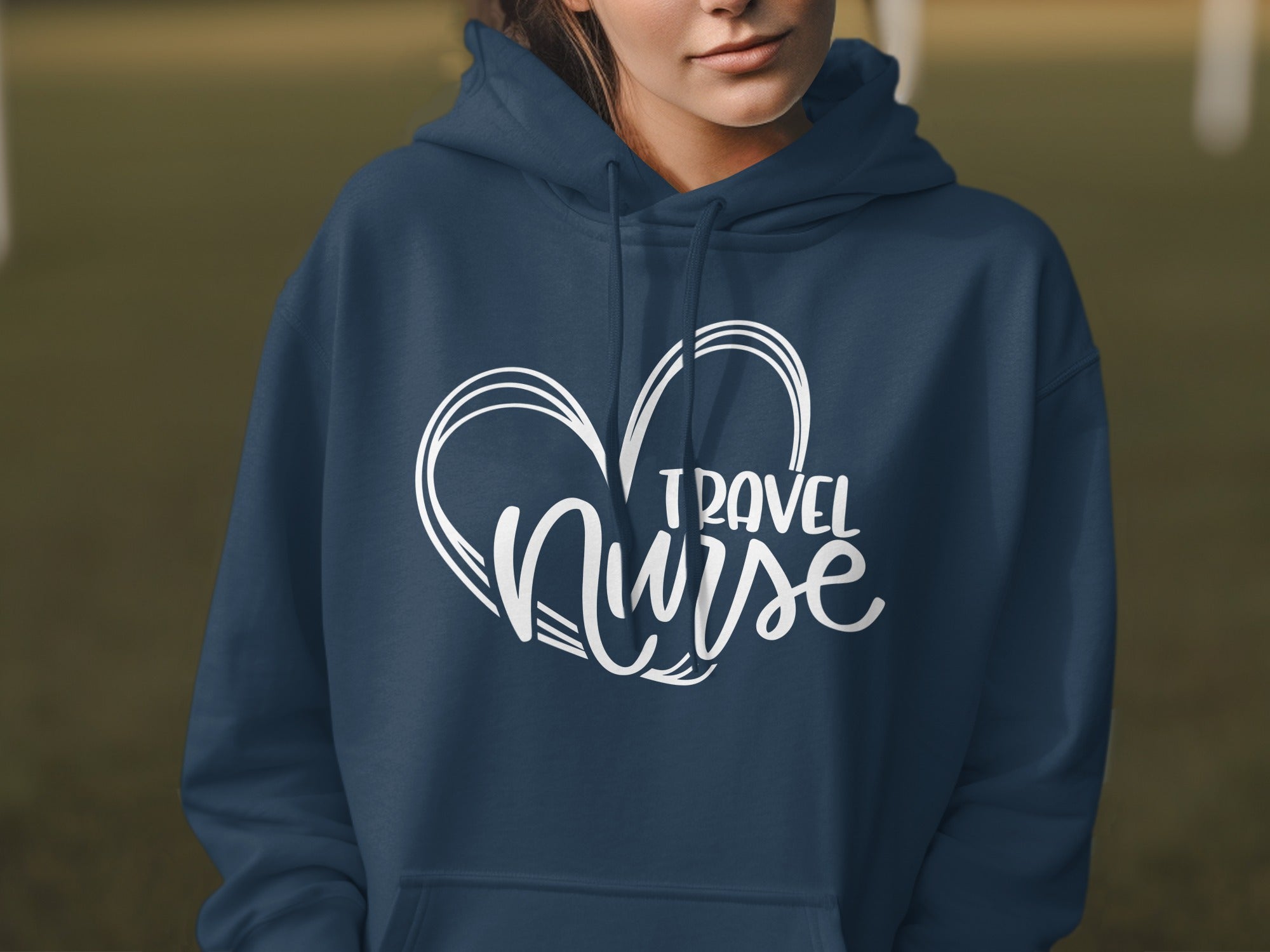 Navy hoodie with white "Travel Nurse" heart graphic on chest.