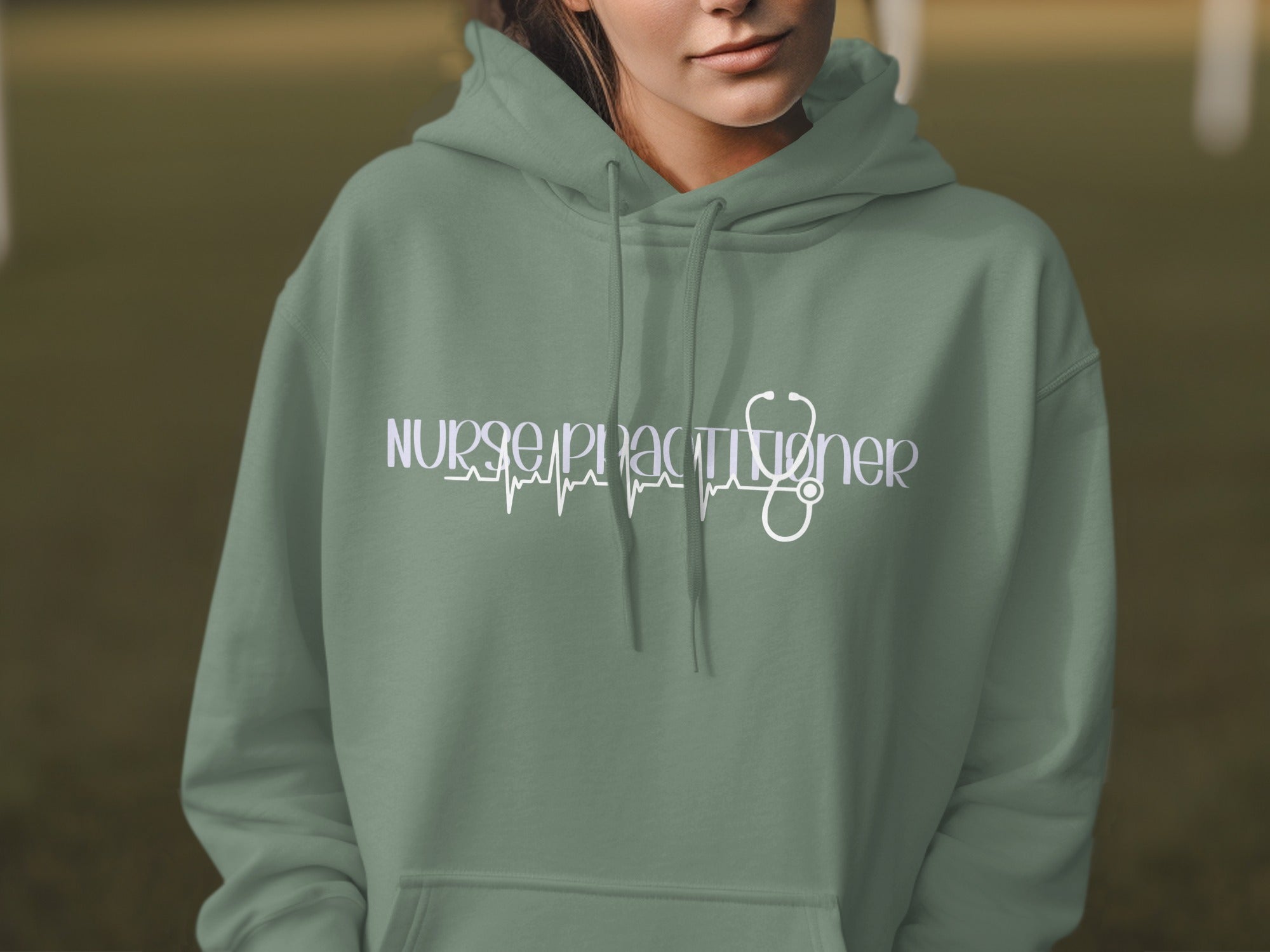 Green hoodie with "Nurse Practitioner" and stethoscope heartbeat graphic.