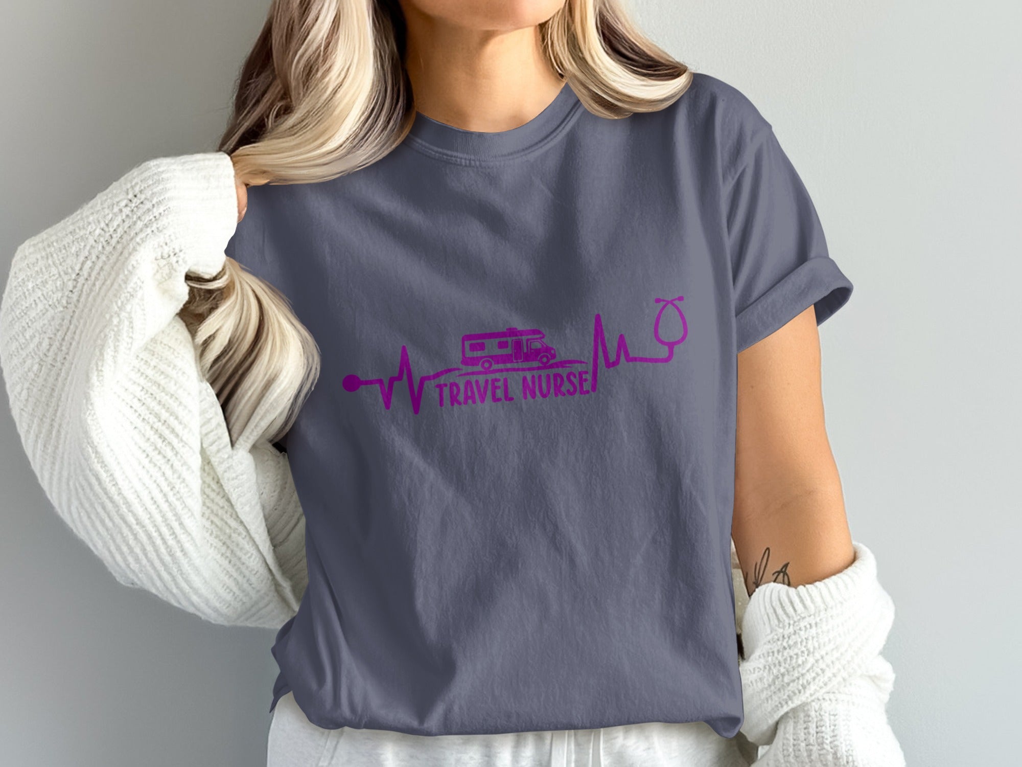 T-shirt with "Travel Nurse" text, camper van, and stethoscope heartbeat design.