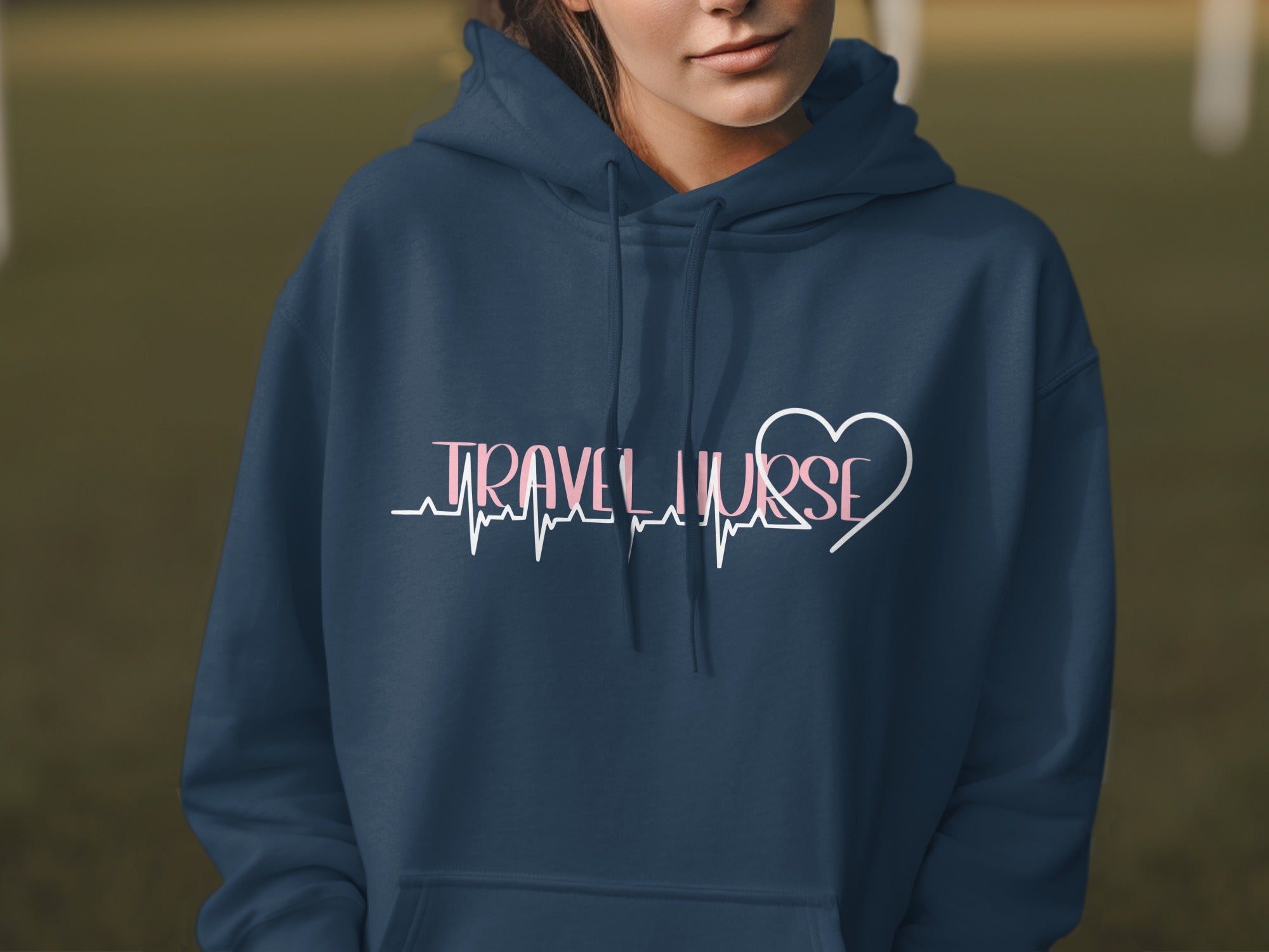 Navy hoodie with "Travel Nurse" text and heart graphic.