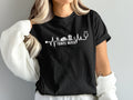 Black t-shirt with a stethoscope and desert scene graphic, saying "Travel Nurse".