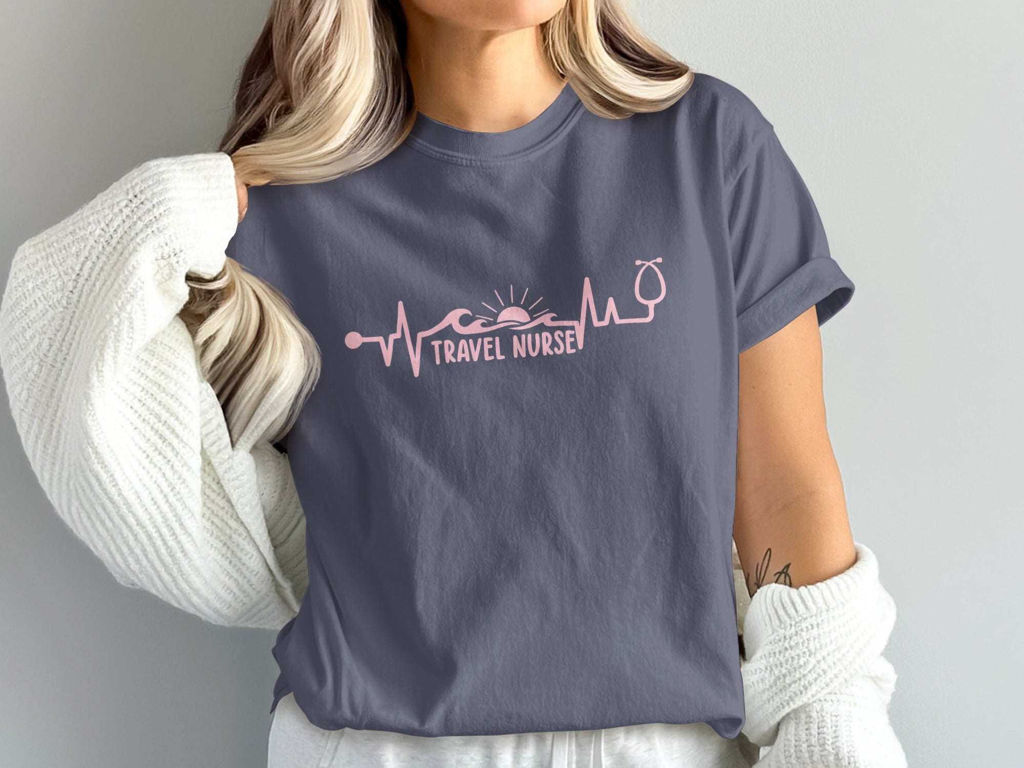 Gray t-shirt with "Travel Nurse" text and stethoscope graphic.