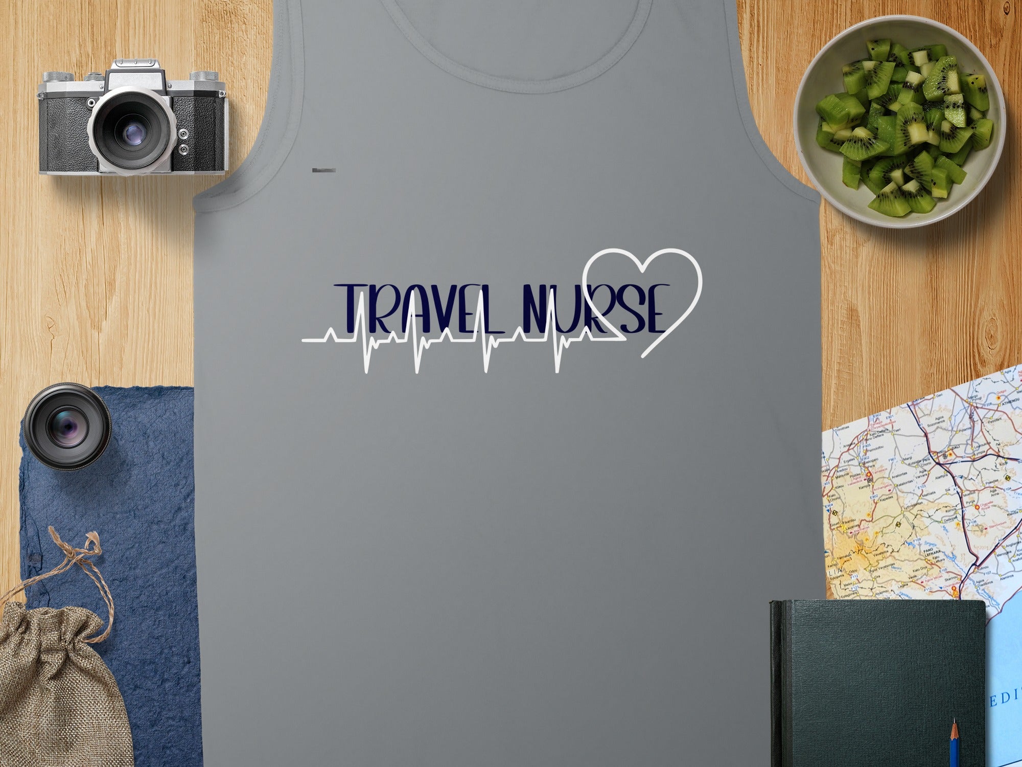 Gray tank top with "TRAVEL NURSE" text and heart rhythm graphic.
