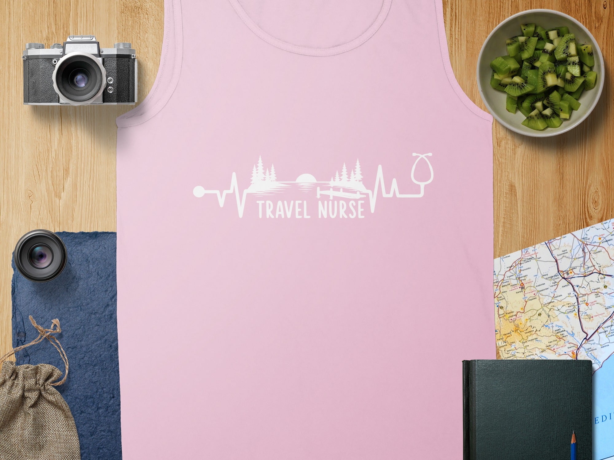 Pink tank top with "Travel Nurse" and heartbeat design.