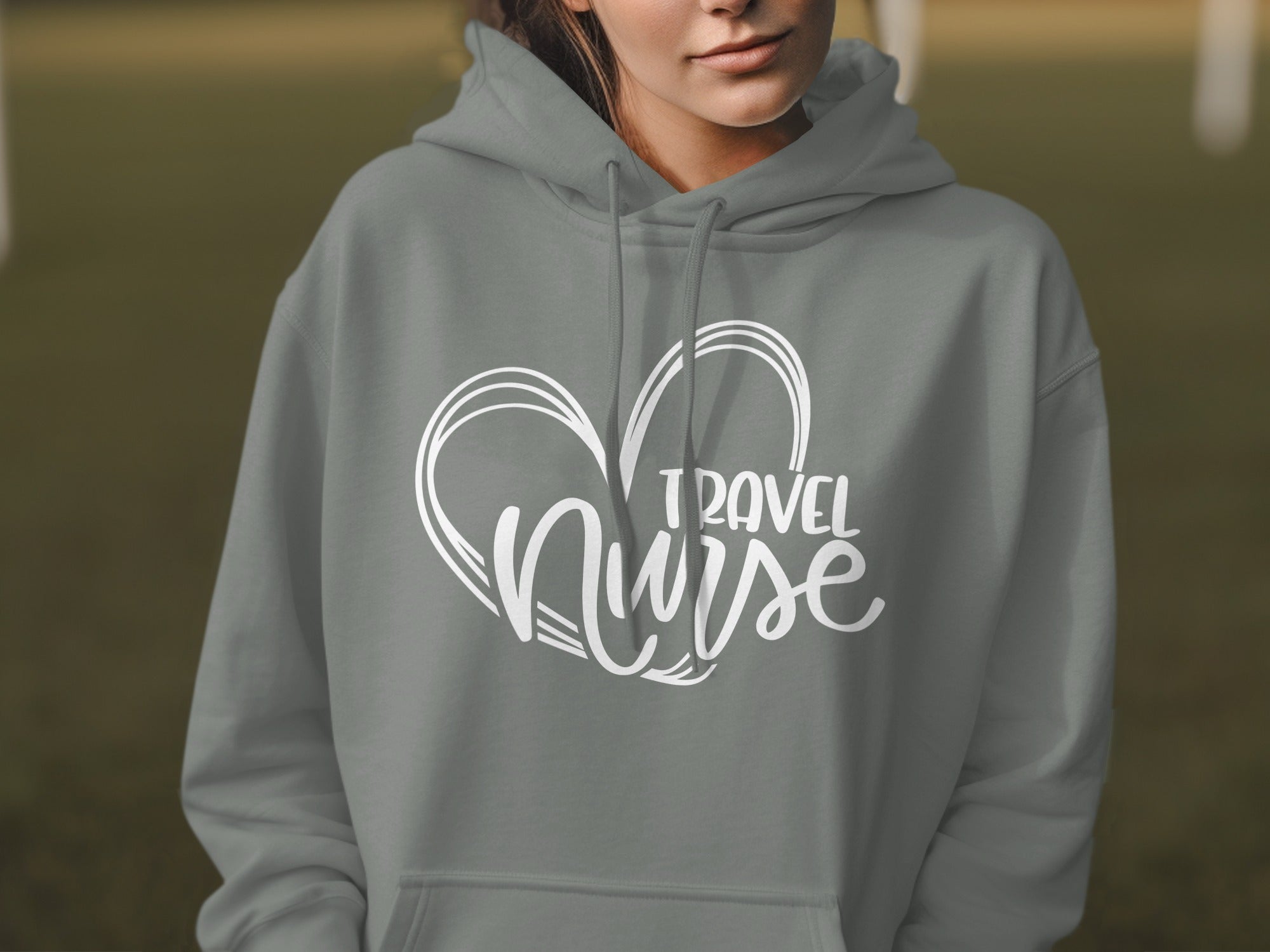 Grey hoodie with "Travel Nurse" heart graphic.