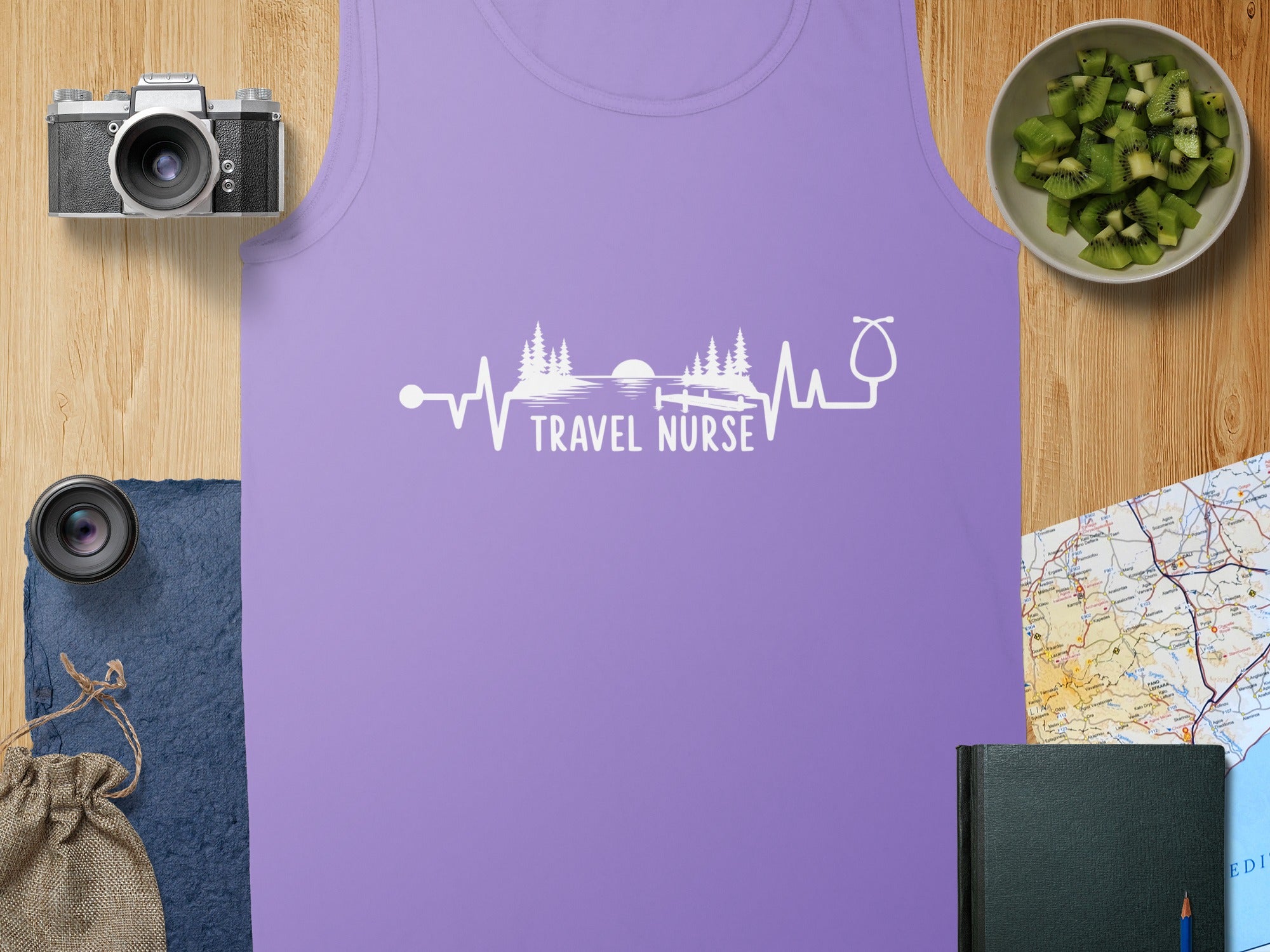 Purple tank top with a white heartbeat graphic and "TRAVEL NURSE" text.